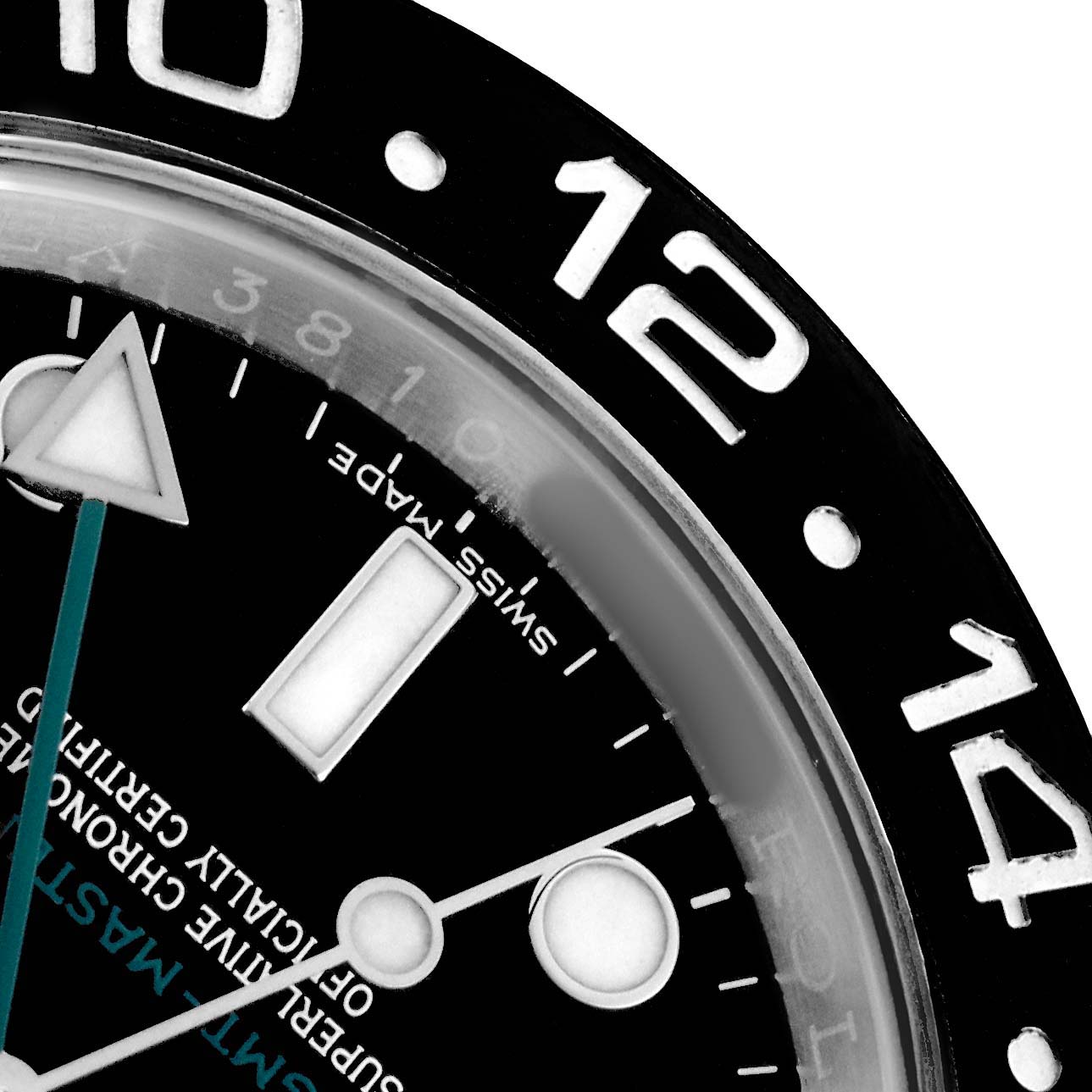 The image shows a close-up of the upper right part of a Rolex GMT-Master 116710 Men
s Stainless Steel Black Dial, highlighting the bezel and part of the dial.