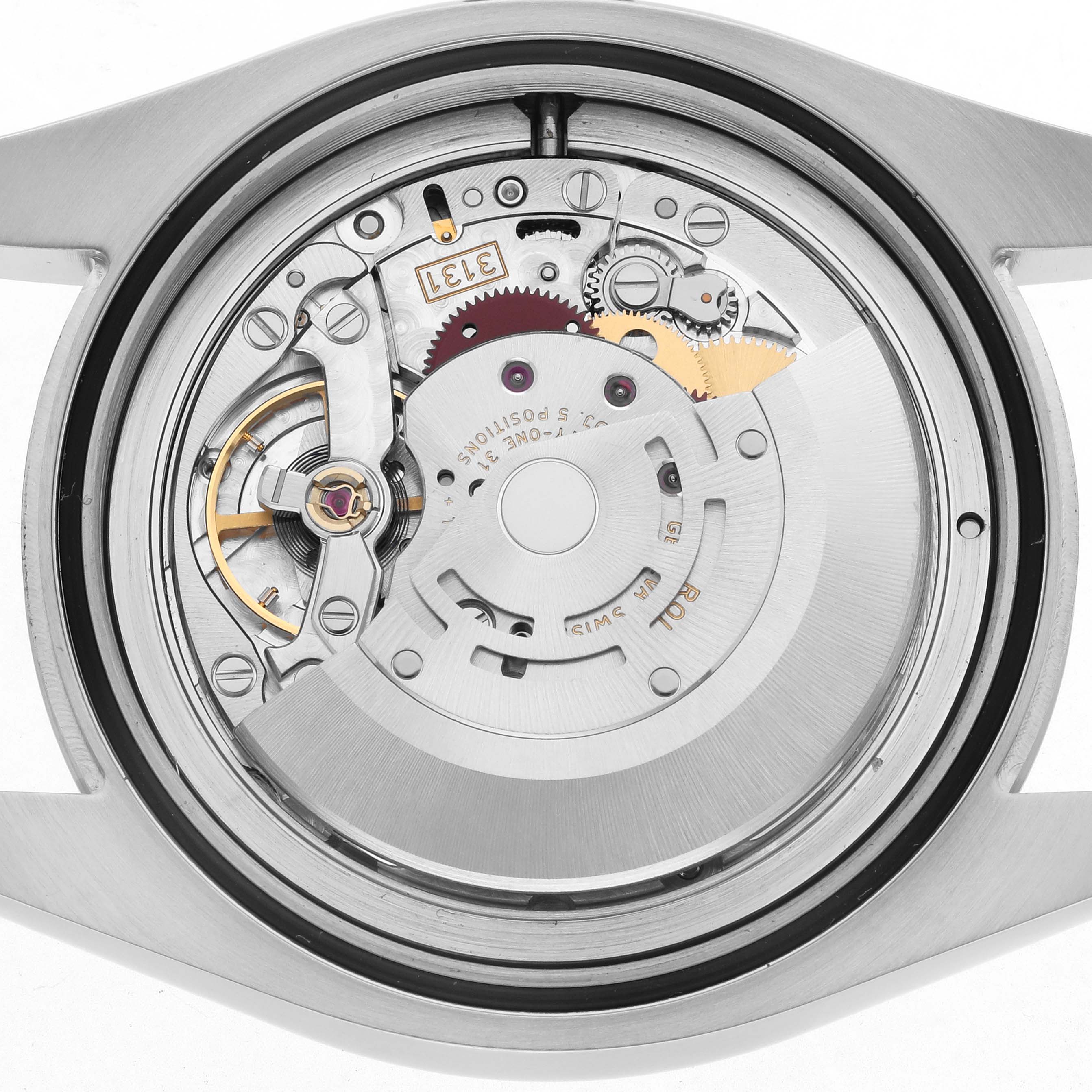 The image shows the movement and internal mechanism of the Rolex Milgauss 116400GV Men's Stainless Steel Black Dial watch from a top-down angle.