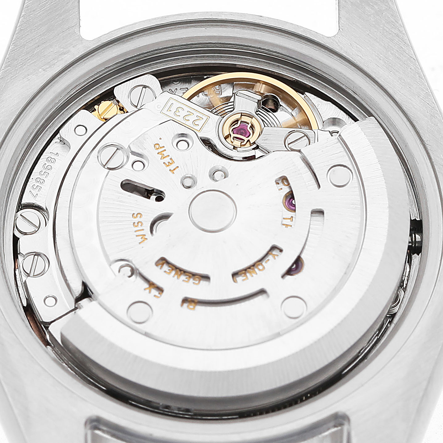 The image shows the back view of a Rolex Oyster Perpetual 176200 Women's Stainless Steel Pink Dial watch, focusing on its internal movement and mechanics.