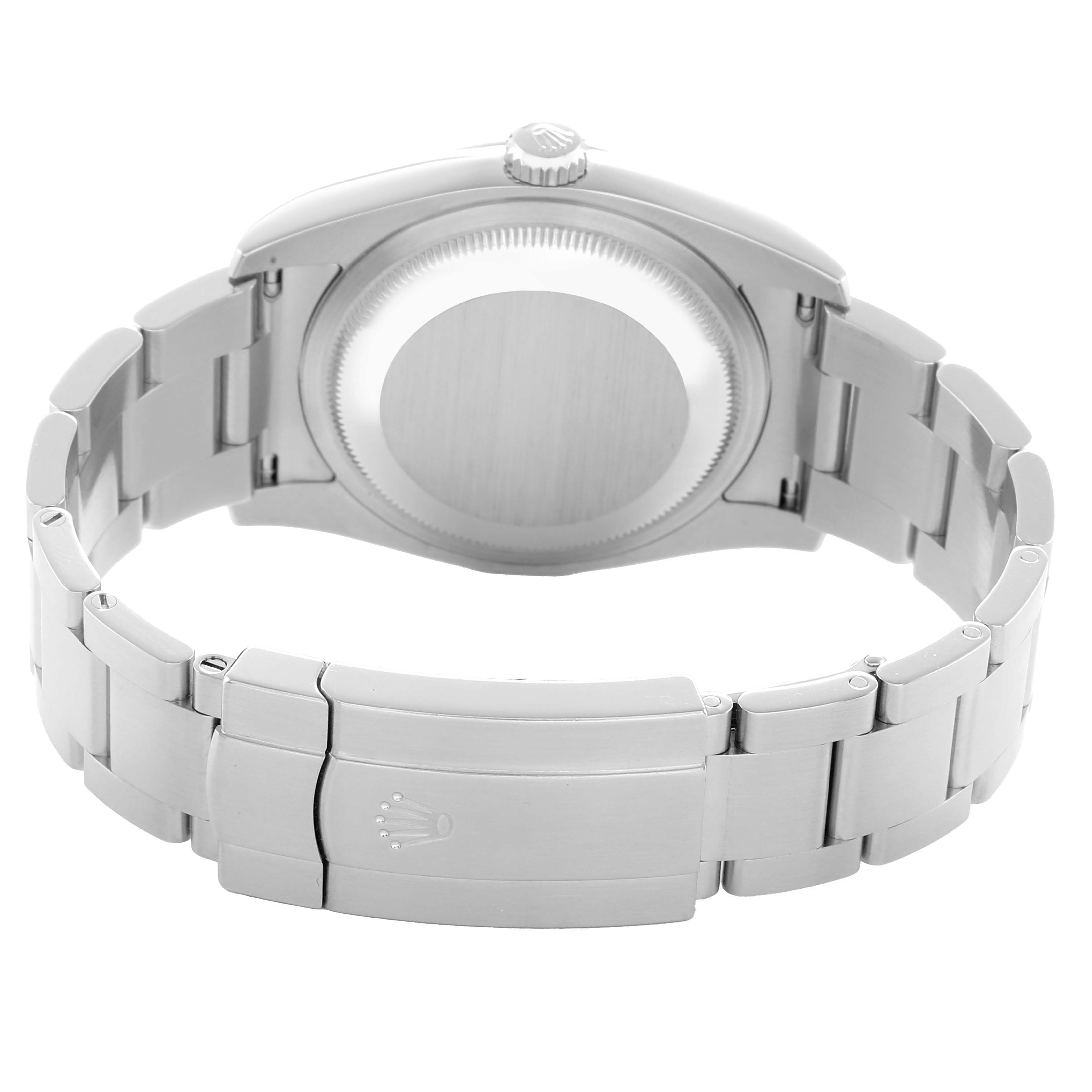 The image shows the back of a Rolex Oyster Perpetual 116000 Men
s Stainless Steel Champagne Dial watch, highlighting the clasp, band, and case back.