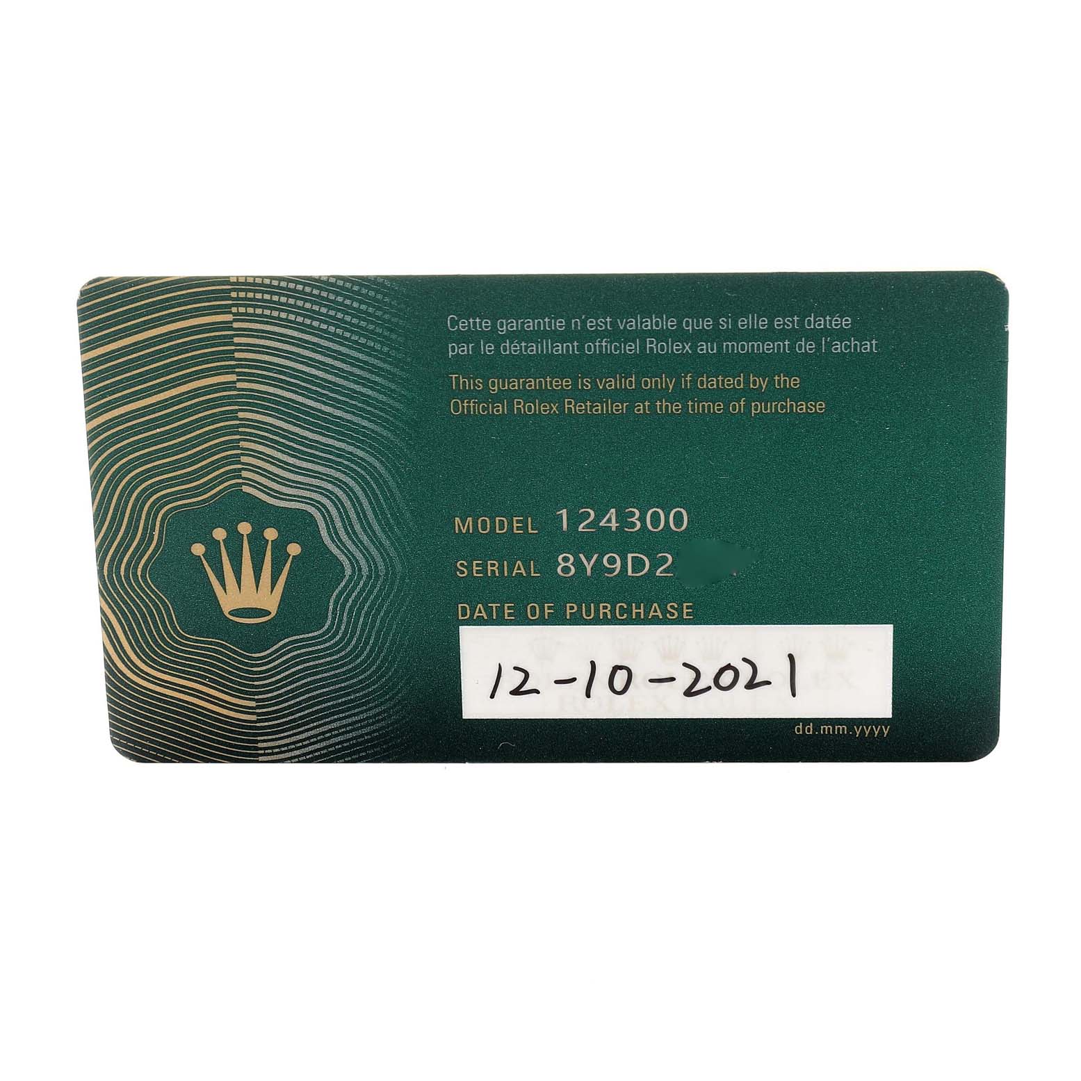 This is a warranty card for the Rolex Oyster Perpetual 124300 Men's Stainless Steel Blue Dial 124300 Men's Stainless Steel Blue Dial model 124300, displaying the serial number and date of purchase.