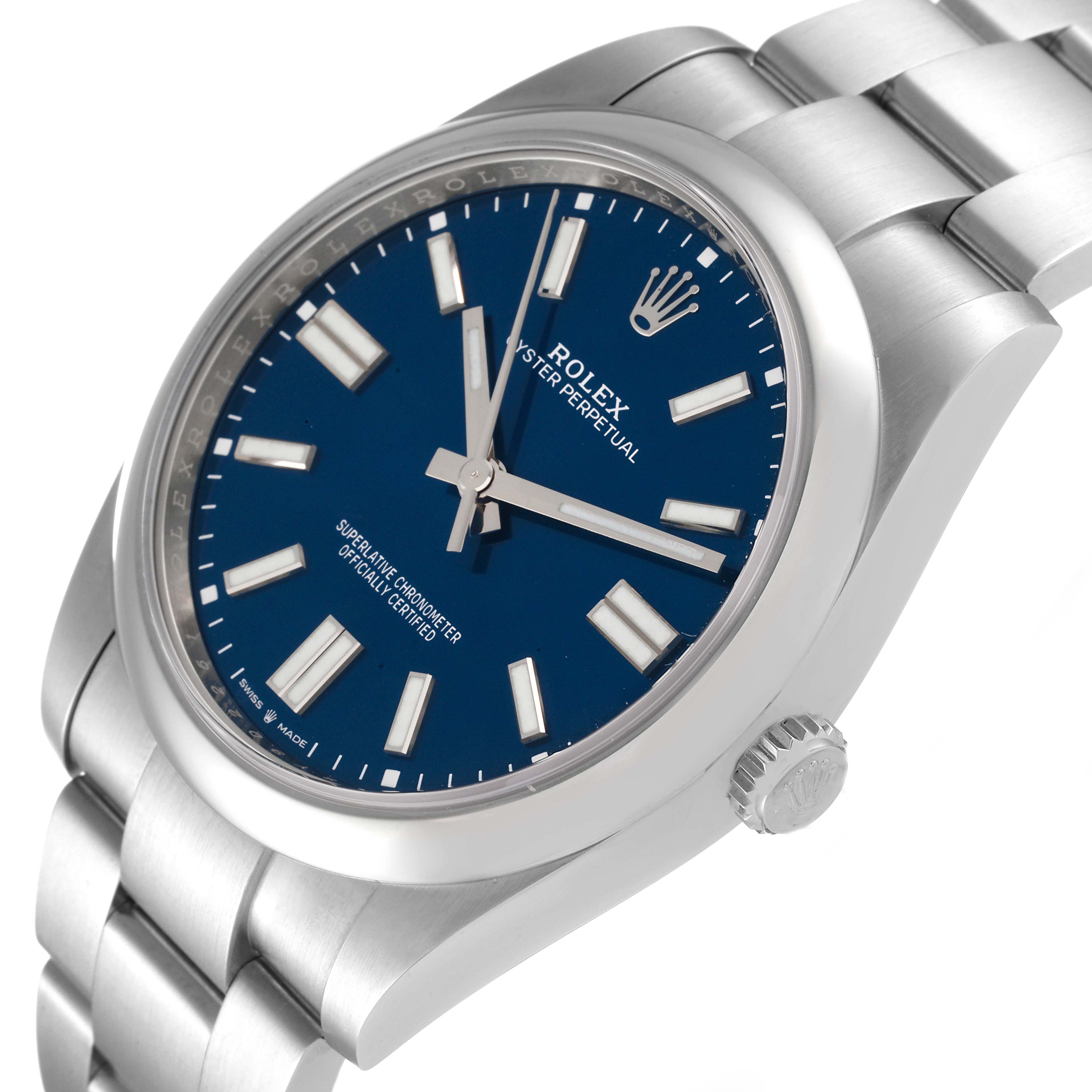 The image shows a Rolex Oyster Perpetual 124300 Men's Stainless Steel Blue Dial 124300 Men's Stainless Steel Blue Dial model watch from a slightly tilted angle, highlighting the blue dial, crown, and bracelet.