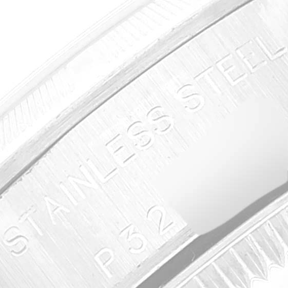 The image shows a close-up of the side of the Rolex Oyster Perpetual 76030 Women's Stainless Steel Blue Dial 76030 Women's Stainless Steel Blue Dial watch, specifically the part with "STAINLESS STEEL" engraved.