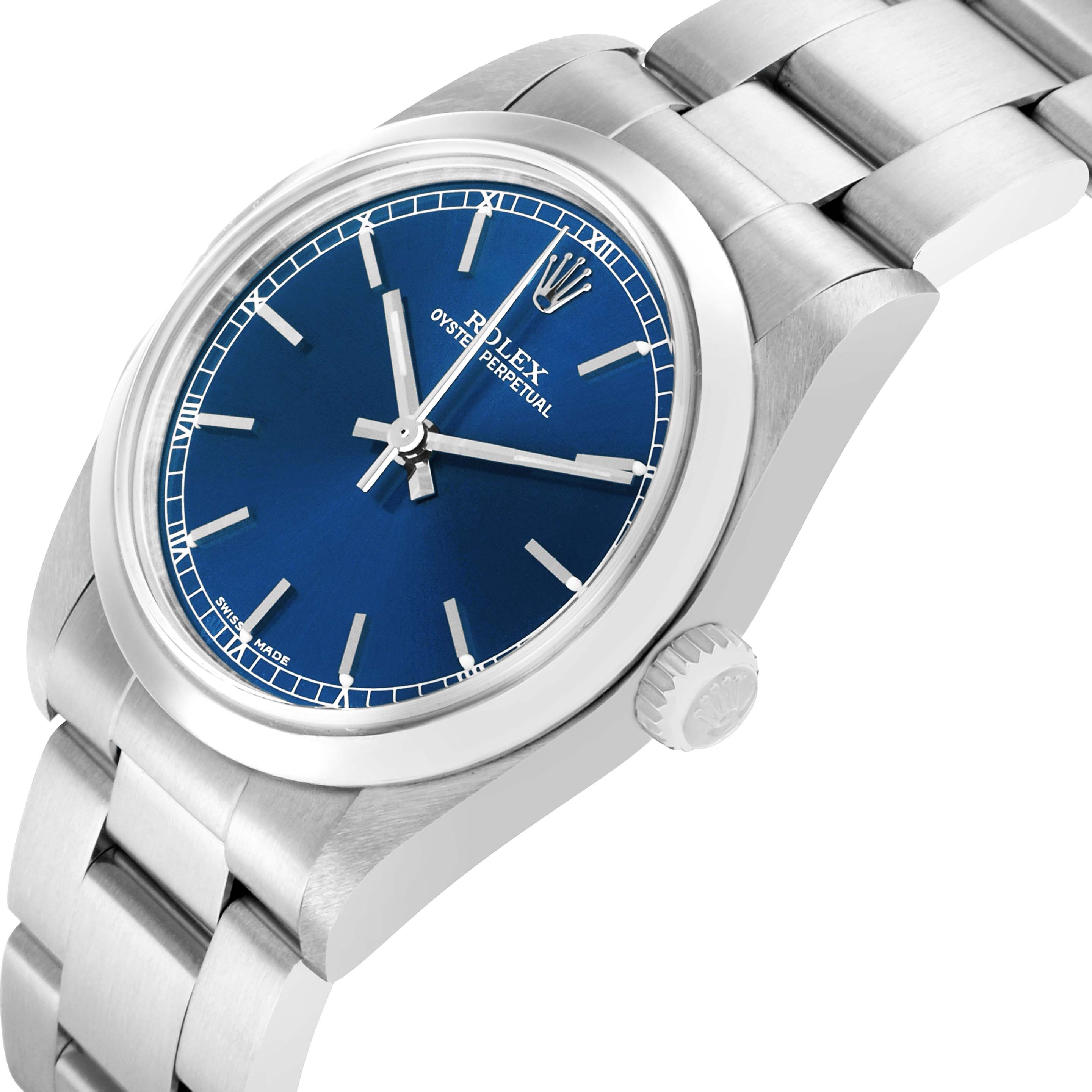 The Rolex Mid-Size 77080 Women
s Stainless Steel Blue Dial watch is shown from a slight side angle, highlighting the dial, bezel, crown, and bracelet.