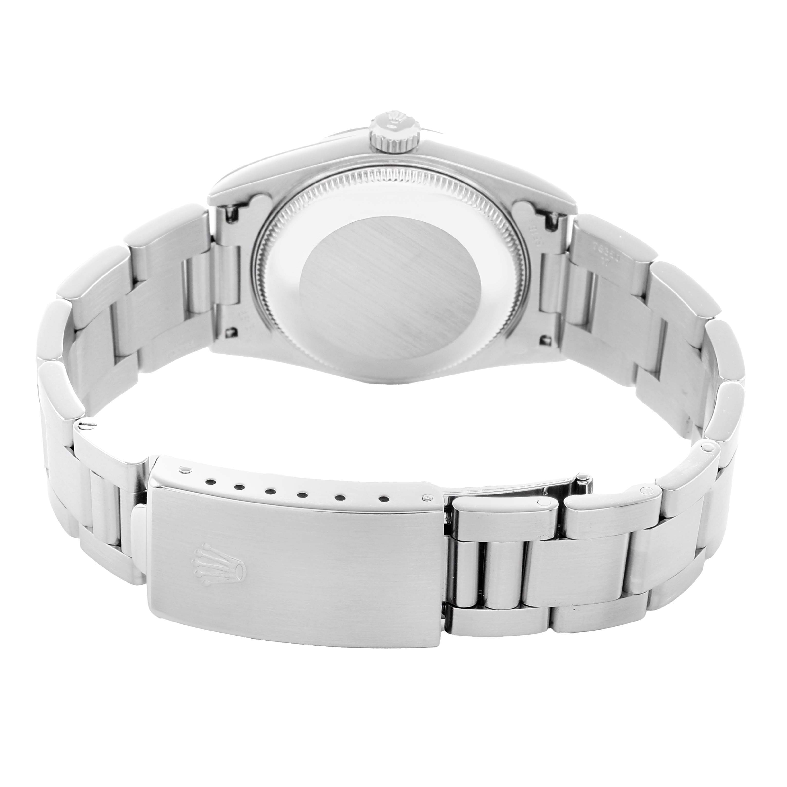 The Rolex Mid-Size 77080 Women
s Stainless Steel Blue Dial model is shown from the back, highlighting the clasp, case back, and part of the bracelet.