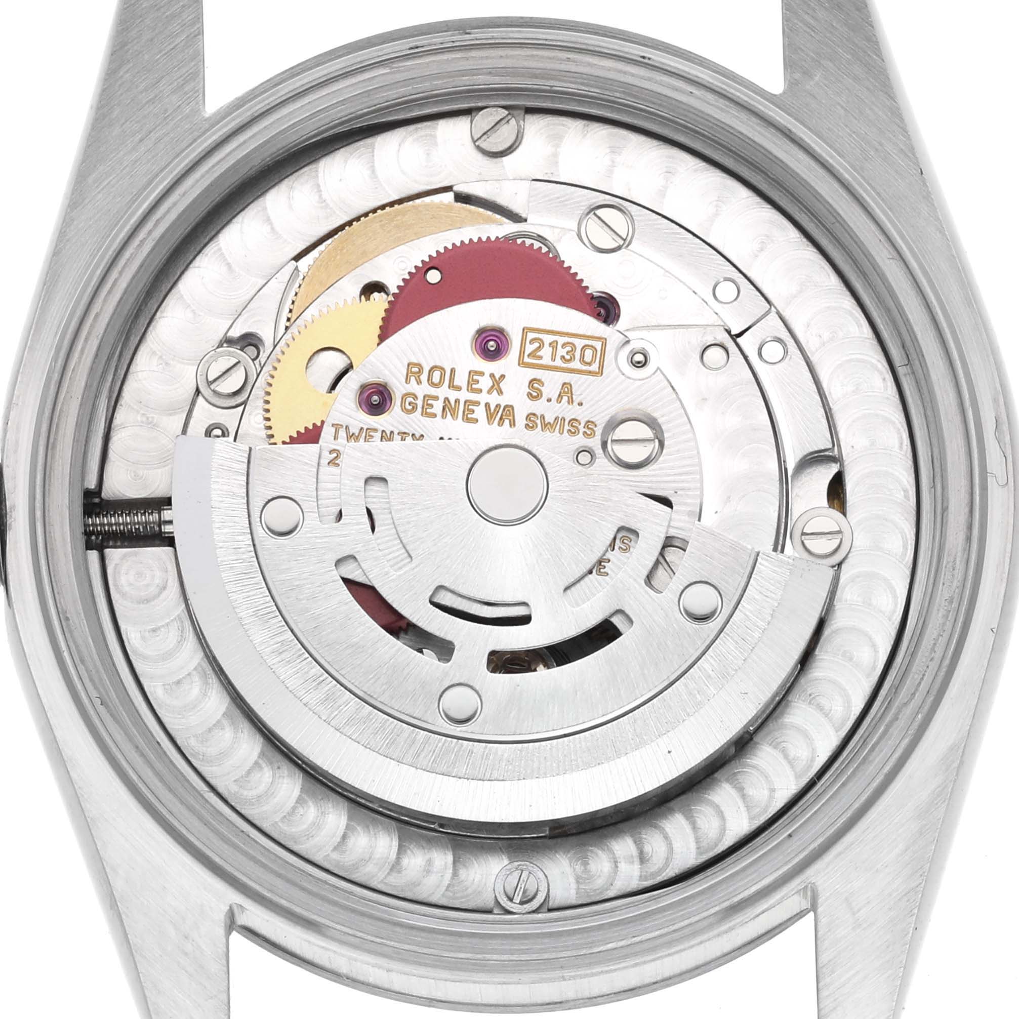 This image shows the back case and movement of a Rolex Mid-Size 67514 Women's Stainless Steel White Dial 67514 Women's Stainless Steel White Dial watch, highlighting its internal mechanics.