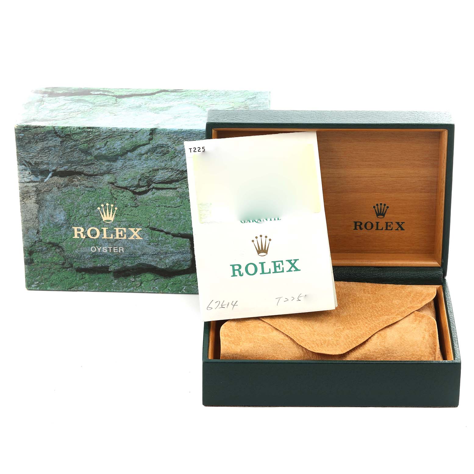 The image shows a Rolex Mid-Size 67514 Women's Stainless Steel White Dial 67514 Women's Stainless Steel White Dial model box from the front, featuring packaging and documentation.
