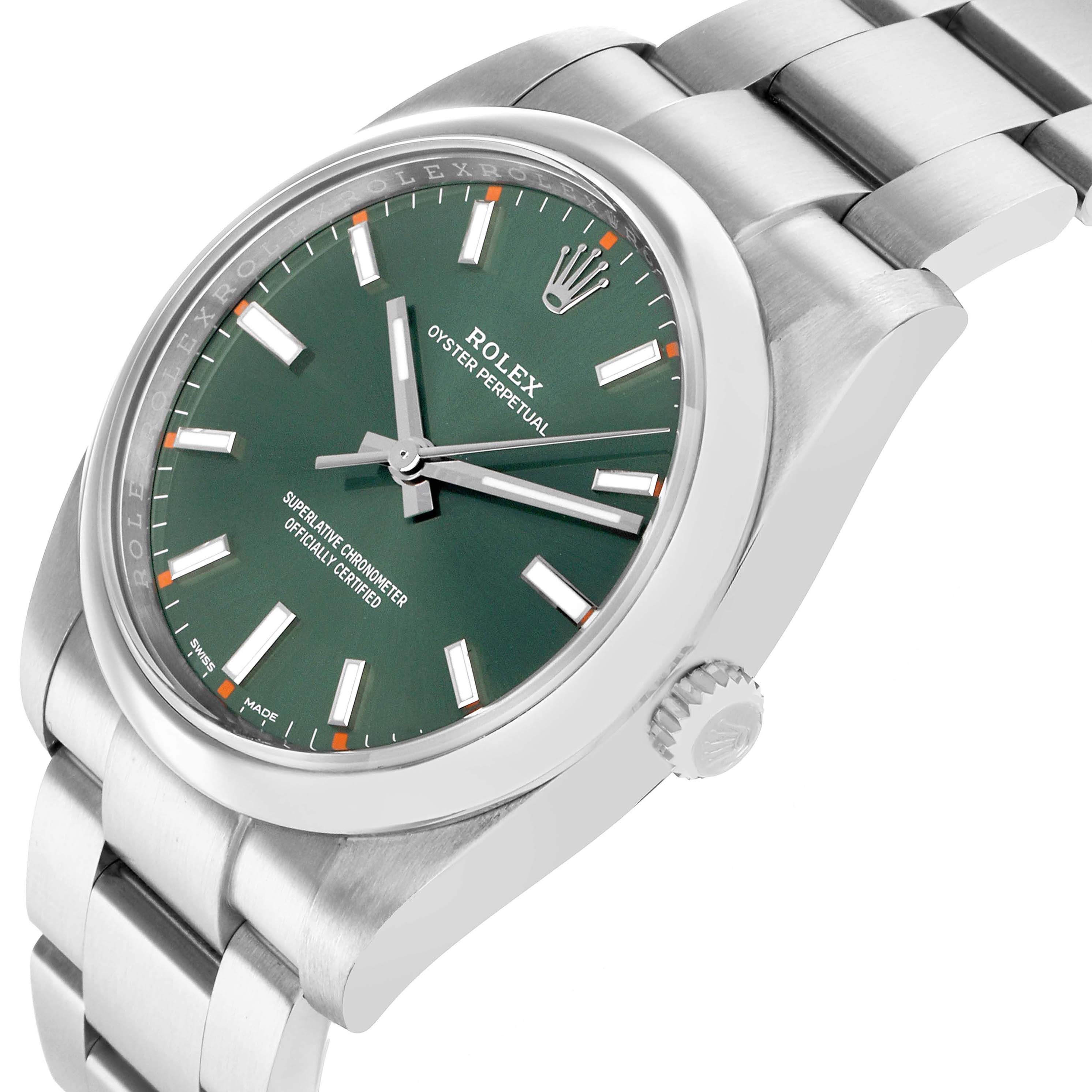The Rolex Oyster Perpetual 114200 Men's Stainless Steel Green Dial watch is shown at a slight side angle, revealing the dial, bezel, crown, and bracelet.