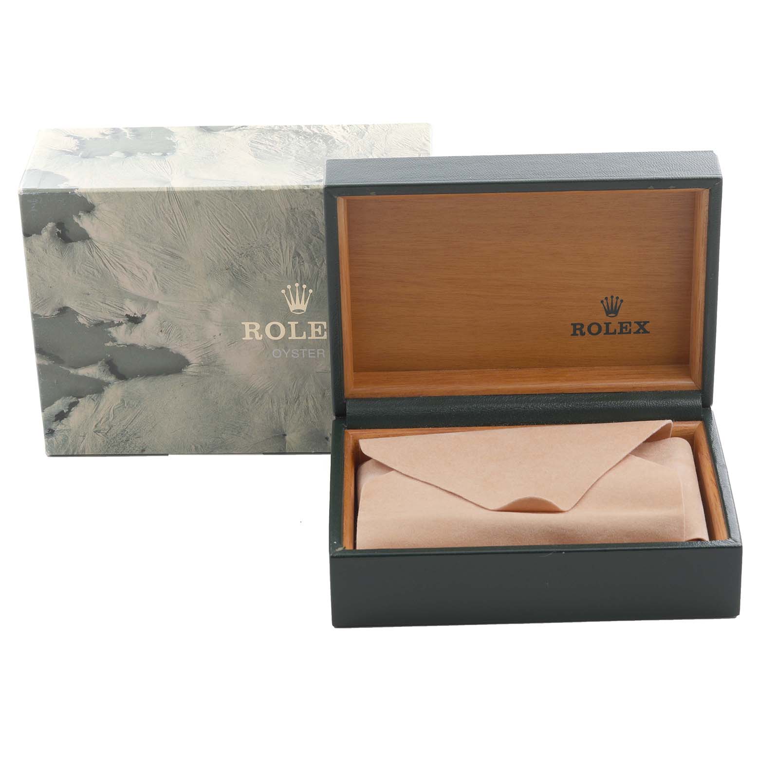 The Rolex Oysterquartz 65218 Men
s Steel and Gold (two tone) White Dial 65218 Men
s Steel and Gold (two tone) White Dial box is open, showing an inner envelope, with the outer box in the background.