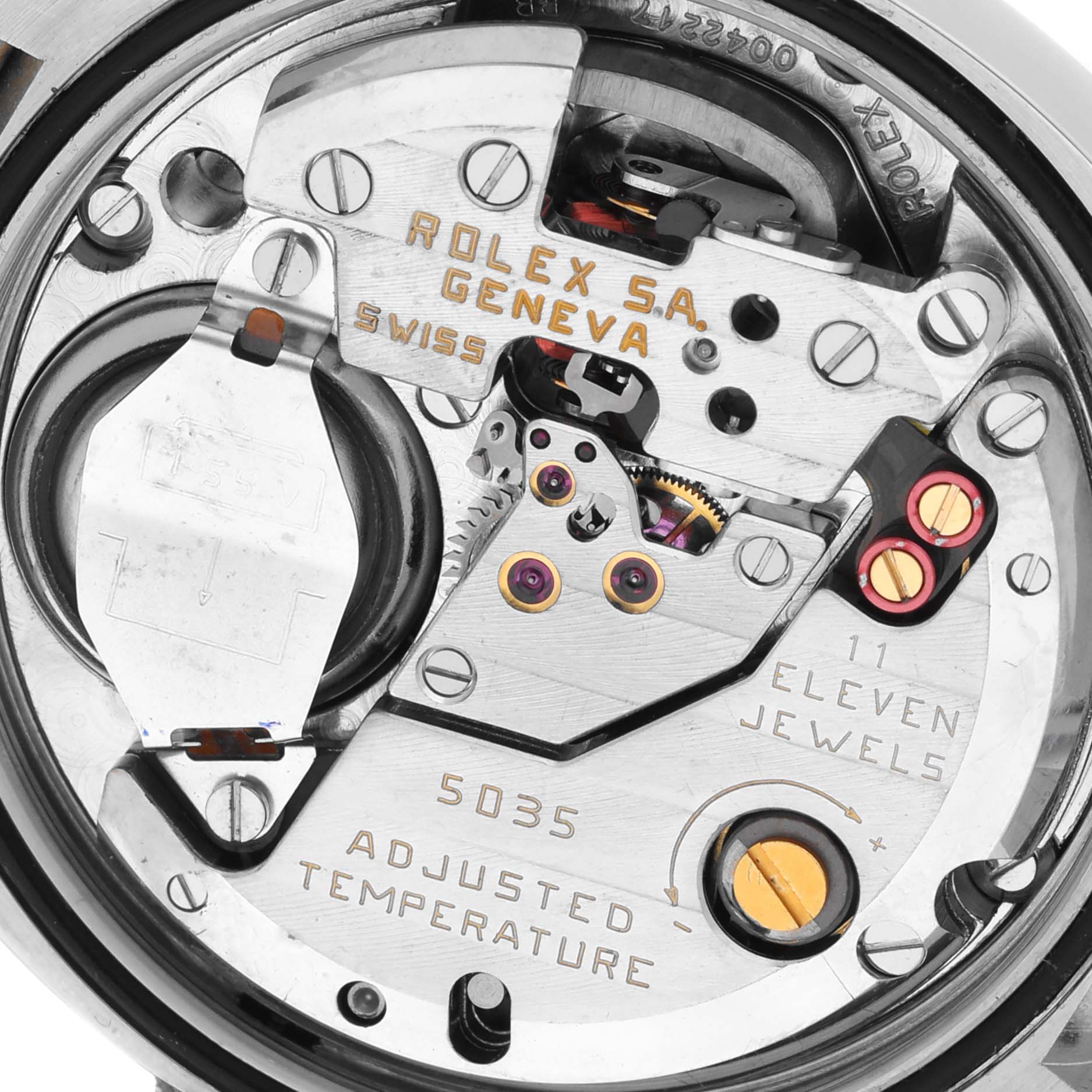 The image shows a close-up of the Rolex Oysterquartz 65218 Men
s Steel and Gold (two tone) White Dial 65218 Men
s Steel and Gold (two tone) White Dial movement, detailing gears and mechanisms.