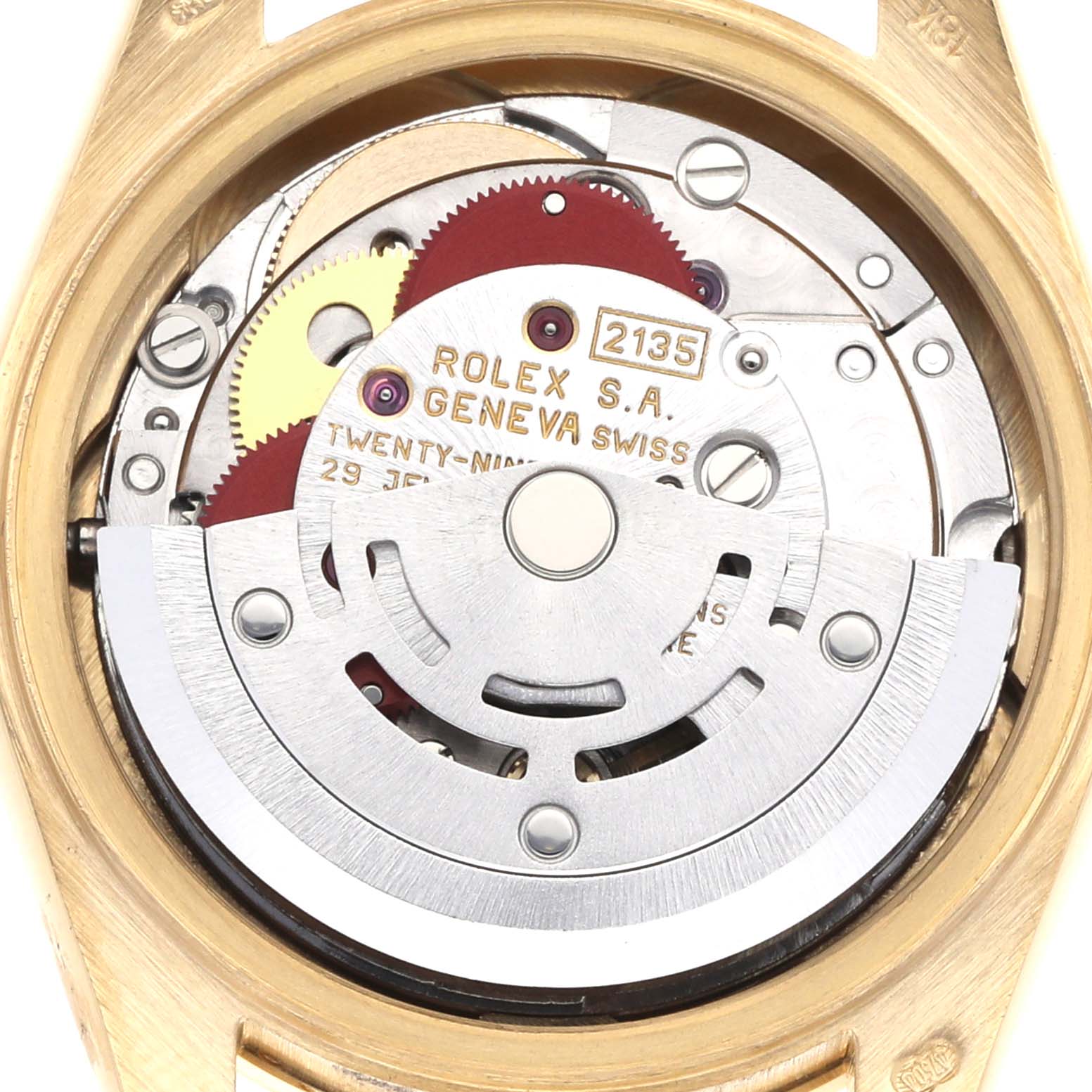 The image shows a detailed view of the movement inside a Rolex President 69138 Women
s Yellow Gold Champagne Dial model watch.