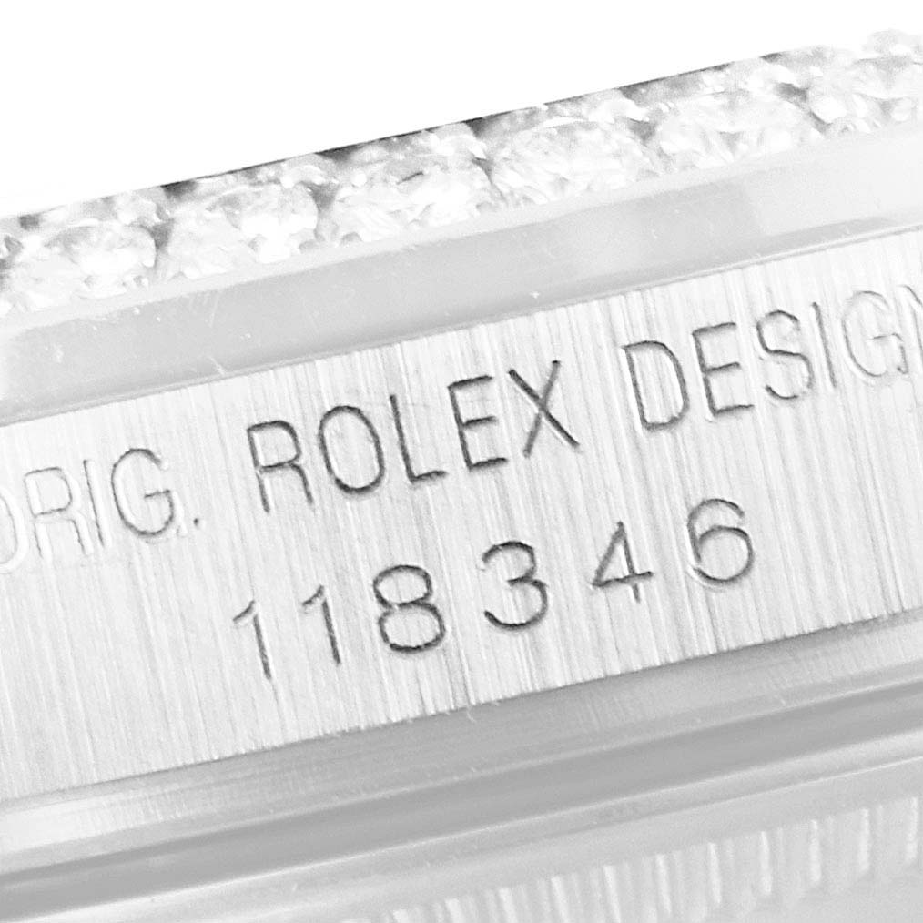 This image shows a close-up of the serial number engraving on the side of a Rolex President 118346 Men's Platinum Silver Dial 118346 Men's Platinum Silver Dial model watch.