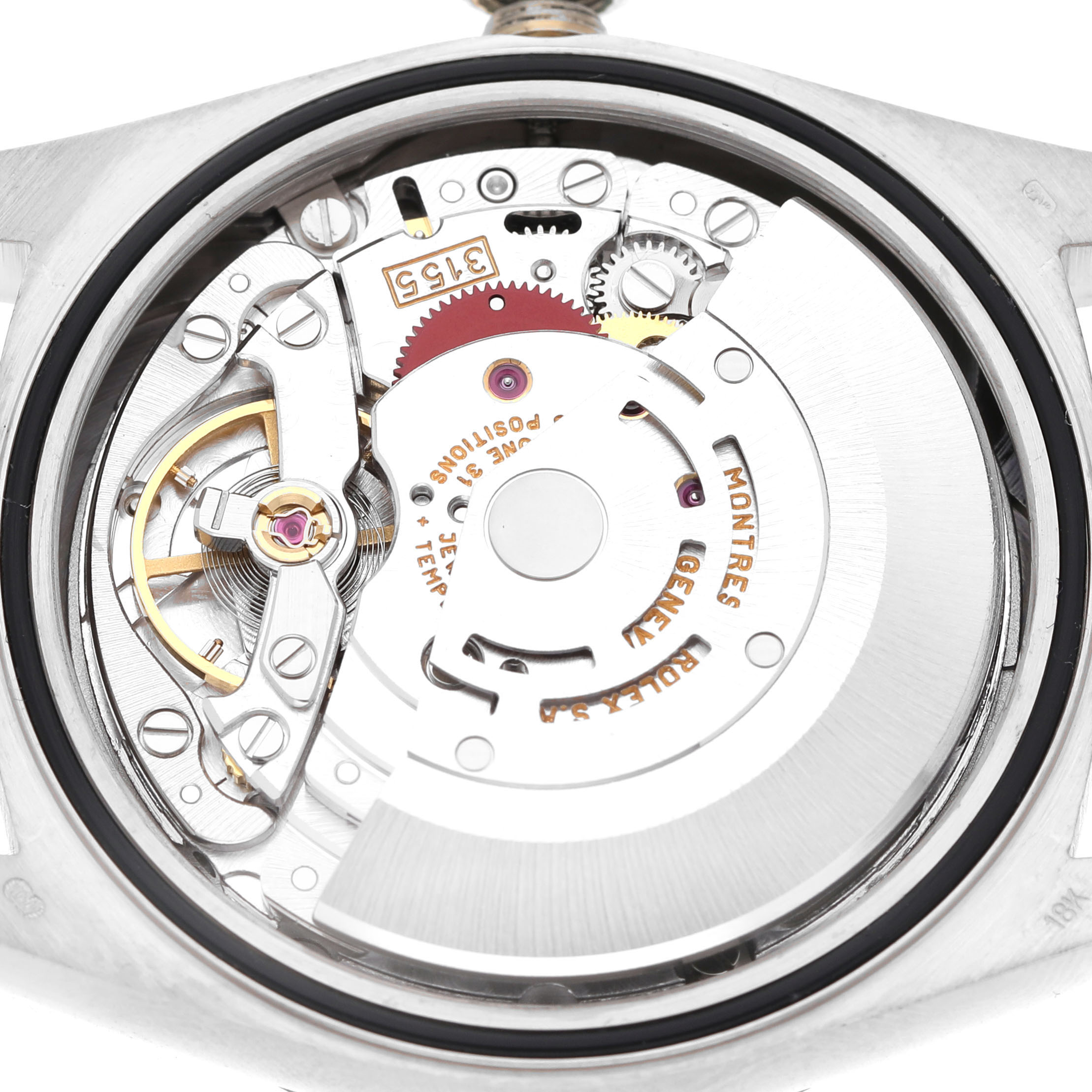 The image shows the internal mechanism of a Rolex President 18239 Men's White Gold Silver Dial model watch from a back angle, highlighting the movement and gears.
