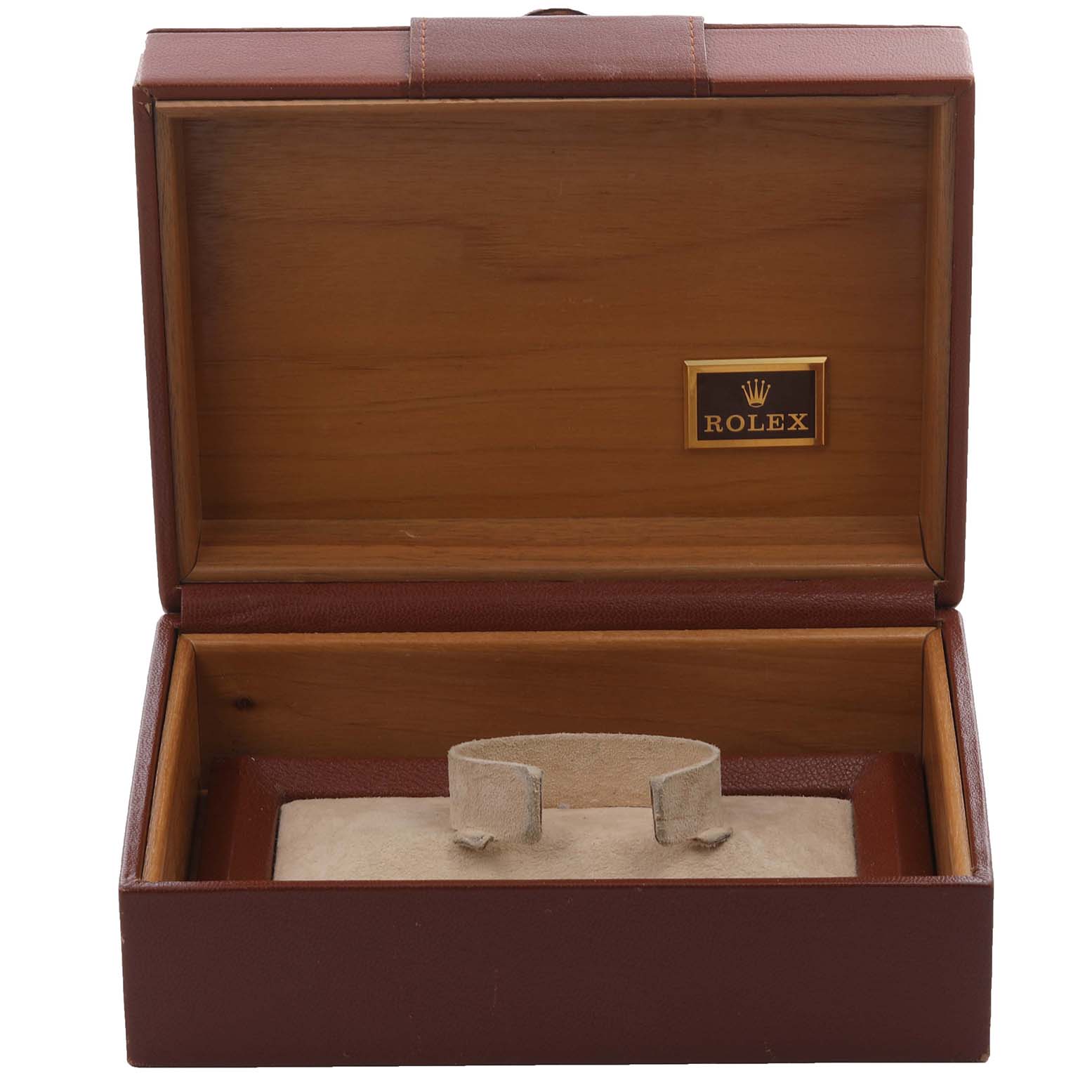 The image shows an open Rolex watch box for the President model, featuring the interior holder and brand logo.
