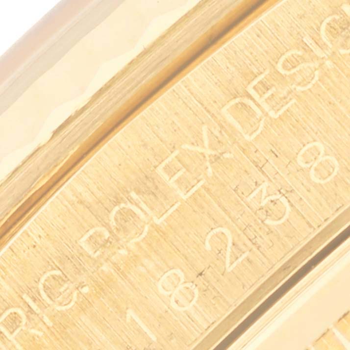 The image shows an engraved side view of a Rolex President 18238 Men's Yellow Gold White Dial 18238 Men's Yellow Gold White Dial model, focusing on the text detailing.