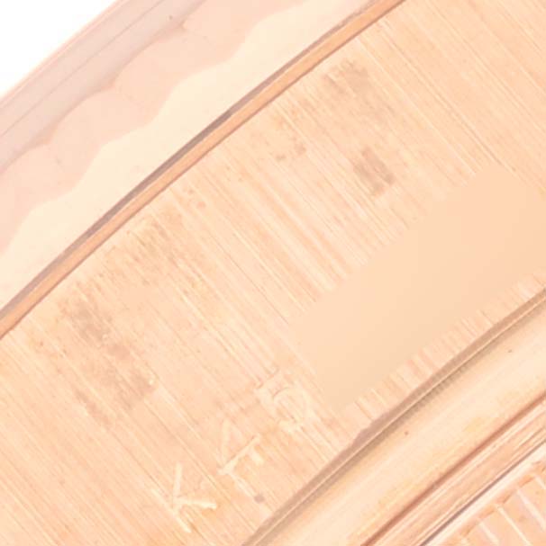 This image shows a close-up of the bezel's edge on a Rolex Datejust watch.