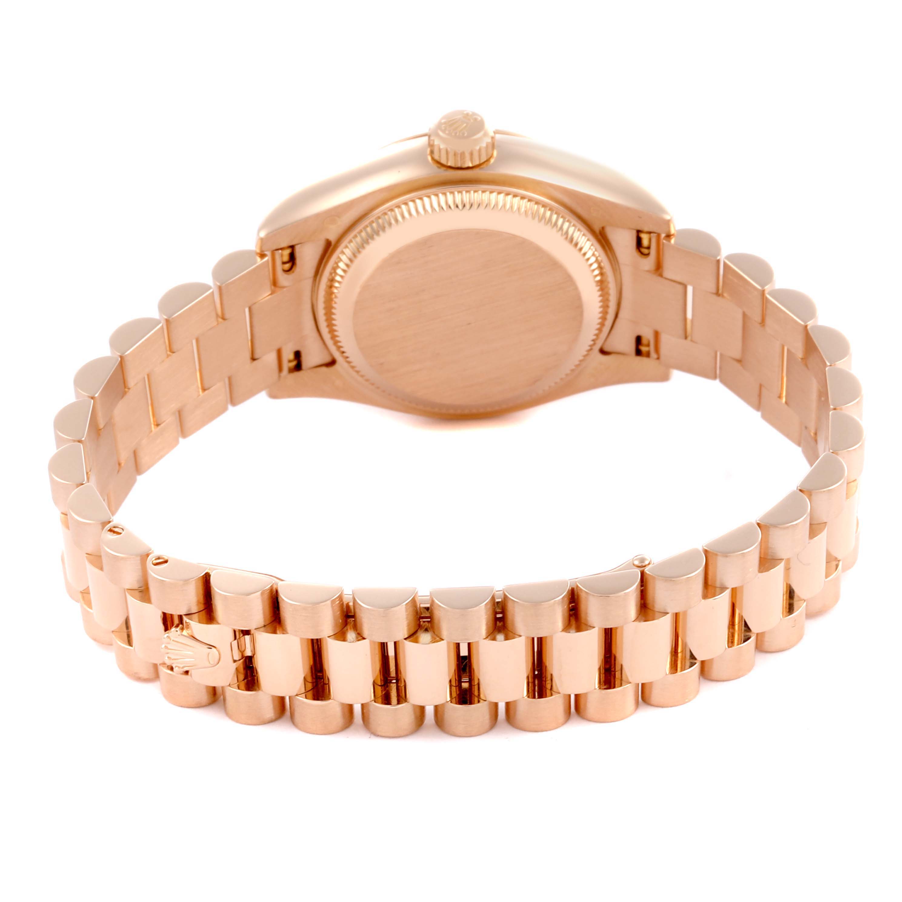 The image shows the Rolex Datejust watch from the back, highlighting the case back and bracelet links.