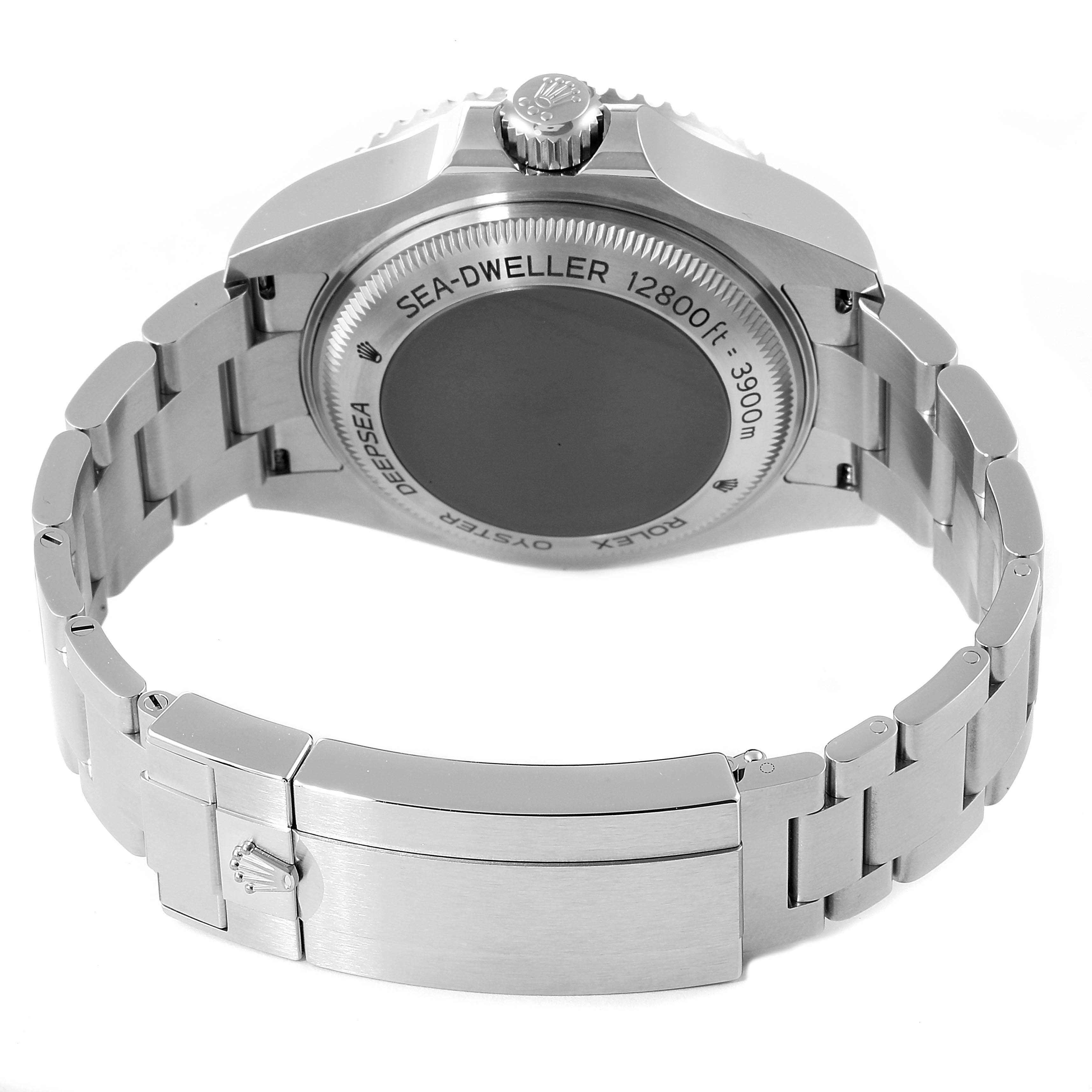 The image shows the back case and bracelet clasp of the Rolex Sea-Dweller 126660 Men
s Stainless Steel Blue Dial 126660 Men
s Stainless Steel Blue Dial watch at an angled rear view.