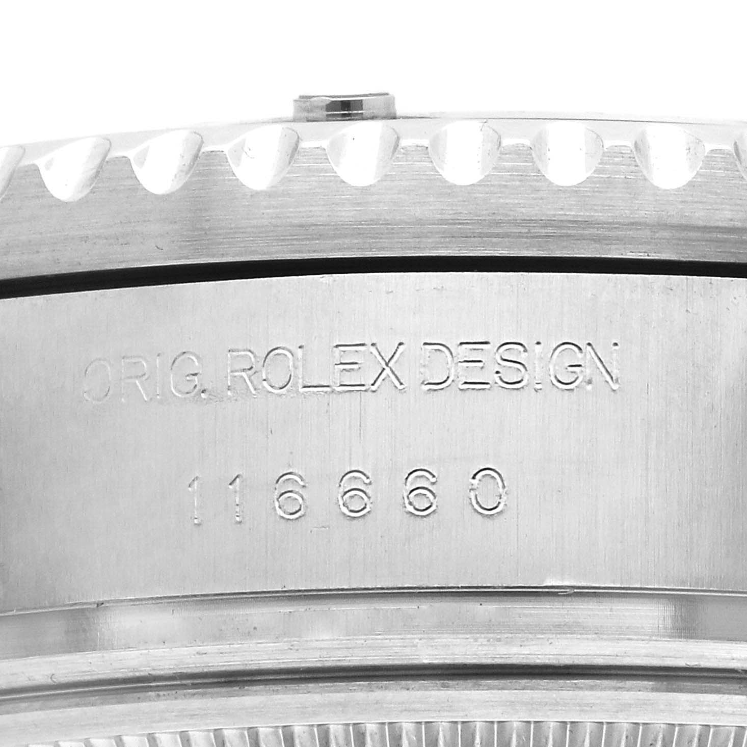 The image shows a close-up of the side of a Rolex Sea-Dweller 116660 Men's Stainless Steel Blue Dial, focusing on its engraved serial number and design markings.