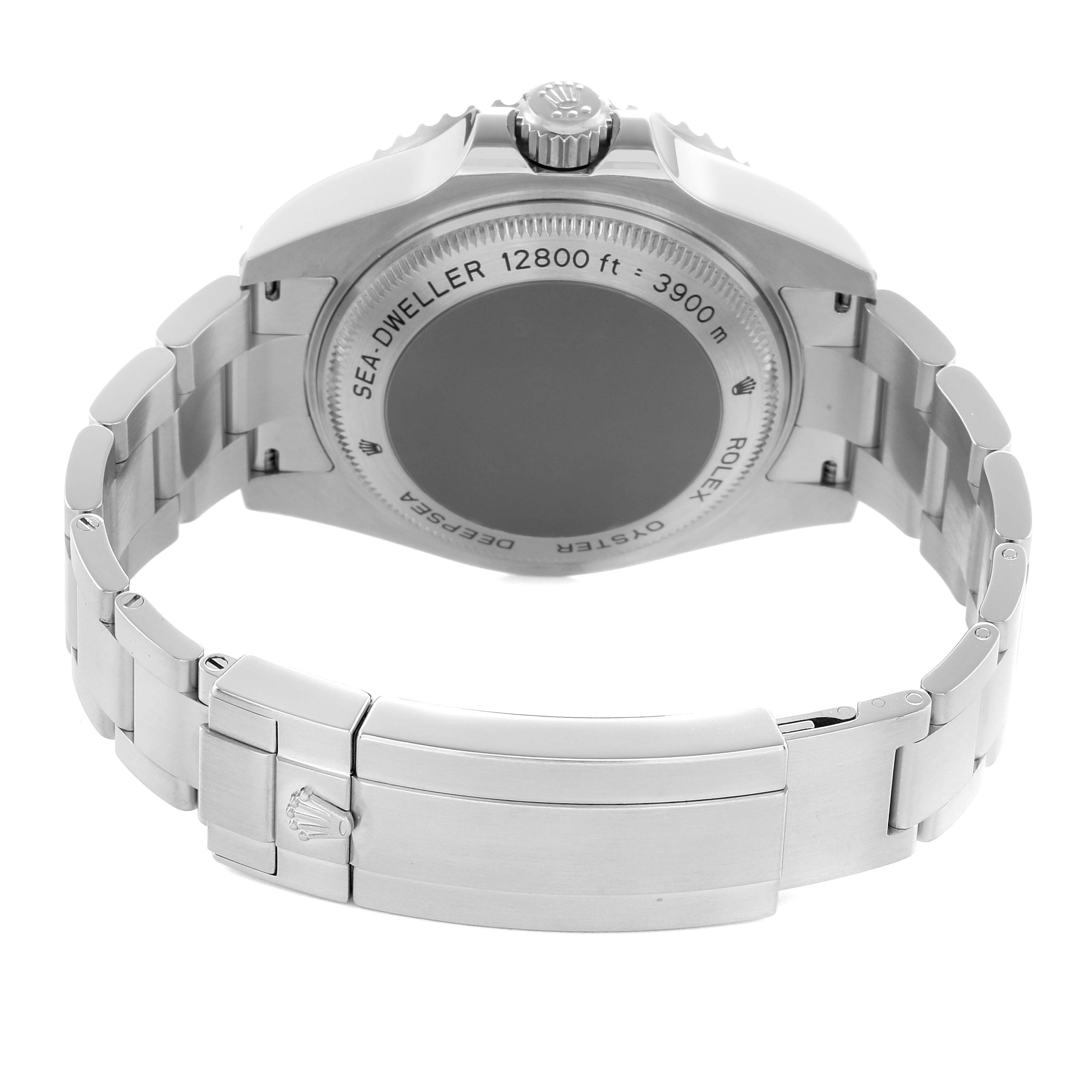 The Rolex Sea-Dweller 116660 Men
s Stainless Steel Black Dial watch is shown from the back, highlighting the case back, bracelet, and clasp.