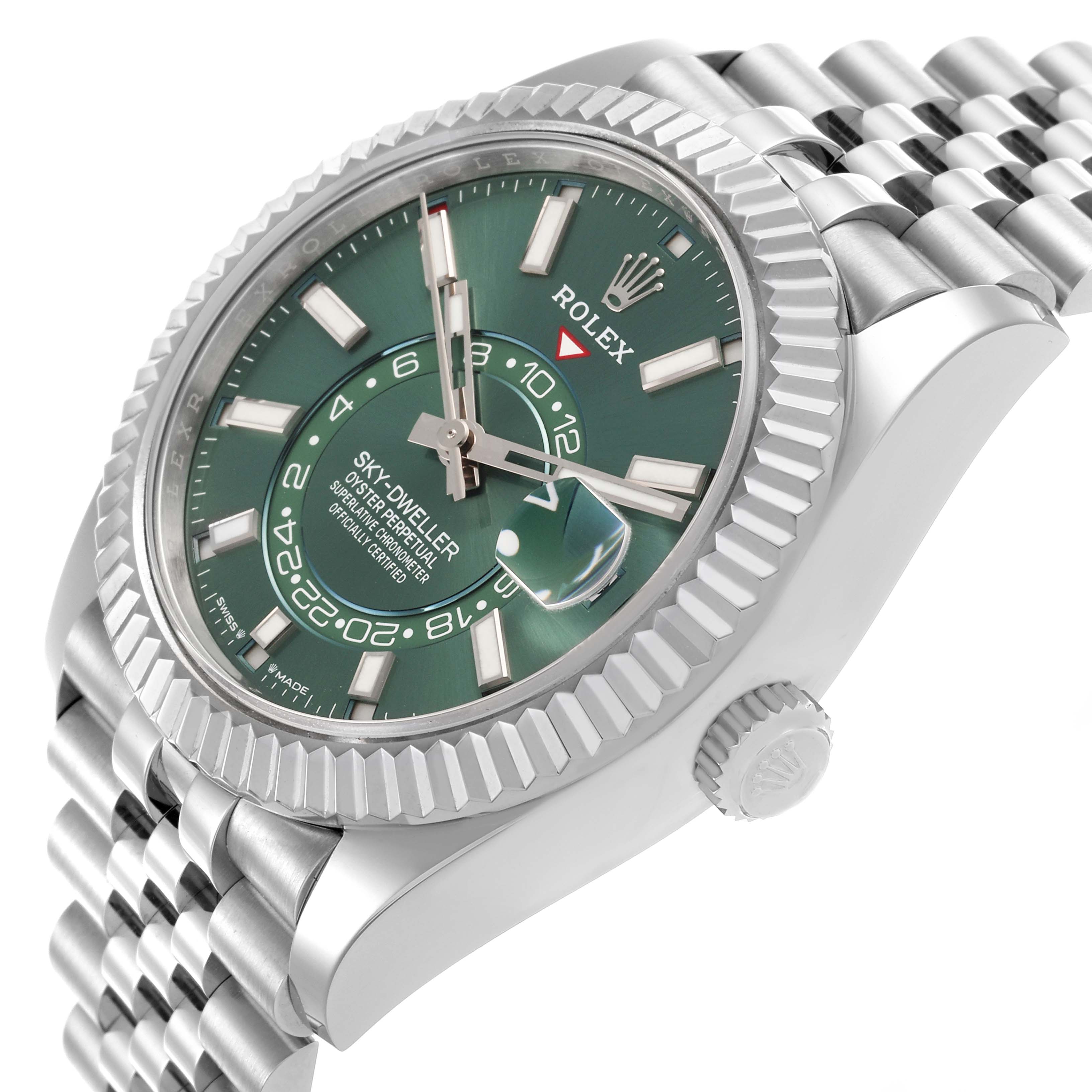 The Rolex Sky-Dweller 336934 Men
s Stainless Steel Green Dial 336934 Men
s Stainless Steel Green Dial is shown at an angled side view, highlighting the green dial, fluted bezel, and Jubilee bracelet.