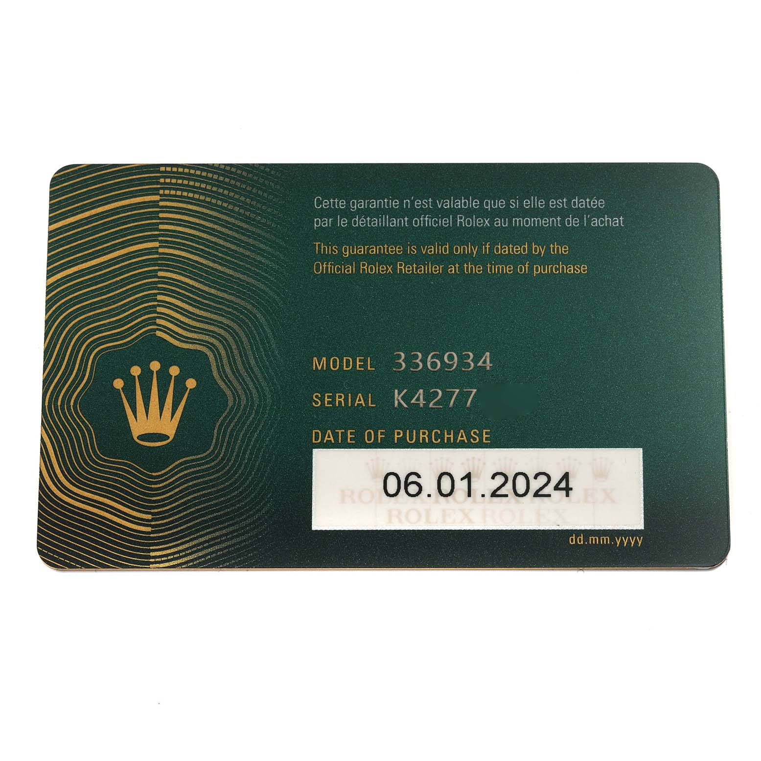 The image shows a guarantee card for a Rolex Sky-Dweller 336934 Men
s Stainless Steel Green Dial 336934 Men
s Stainless Steel Green Dial, displaying the model and serial number details.