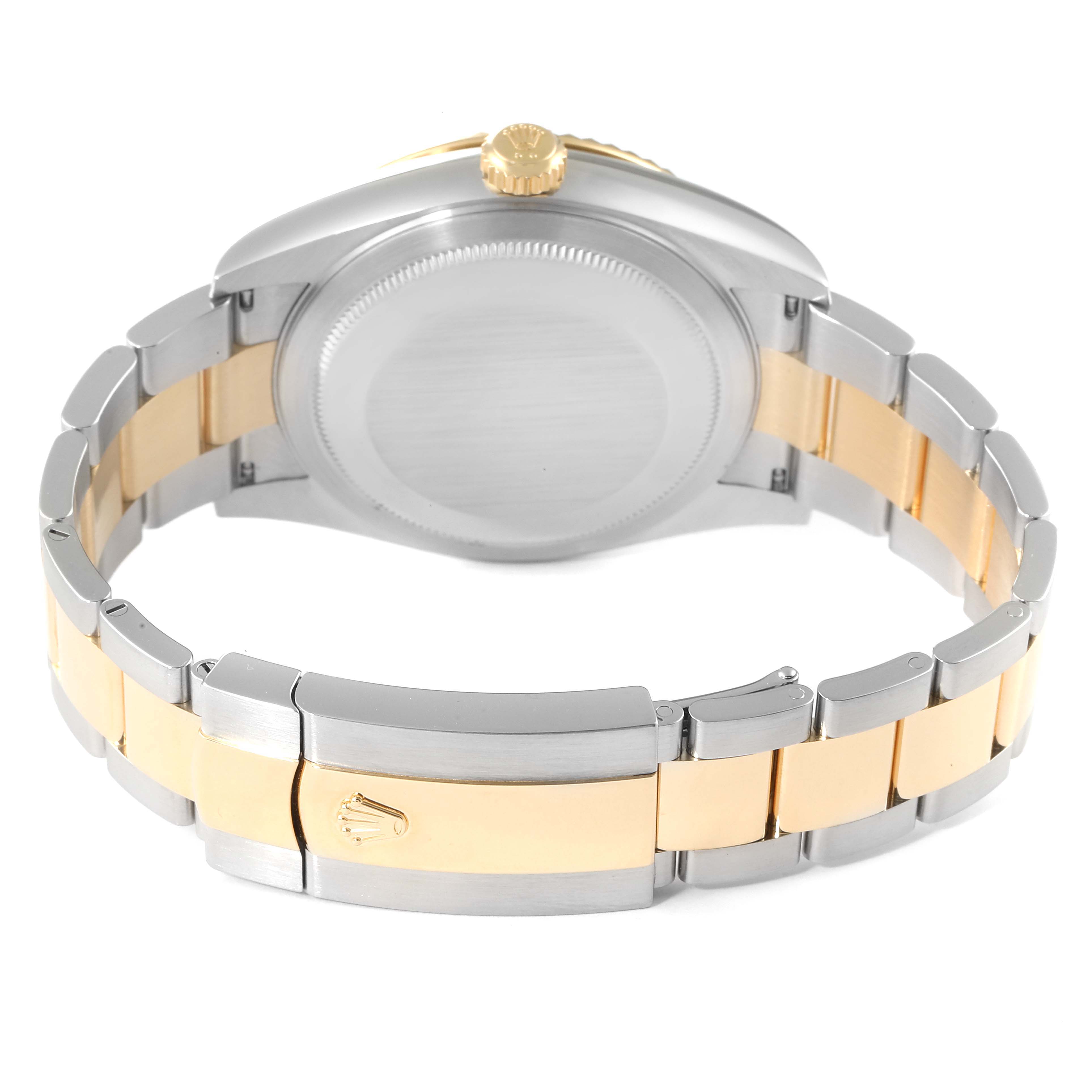 The image shows the back view of a Rolex Sky-Dweller 326933 Men's Steel and Gold (two tone) Black Dial 326933 Men's Steel and Gold (two tone) Black Dial watch, focusing on the bracelet and the case back.