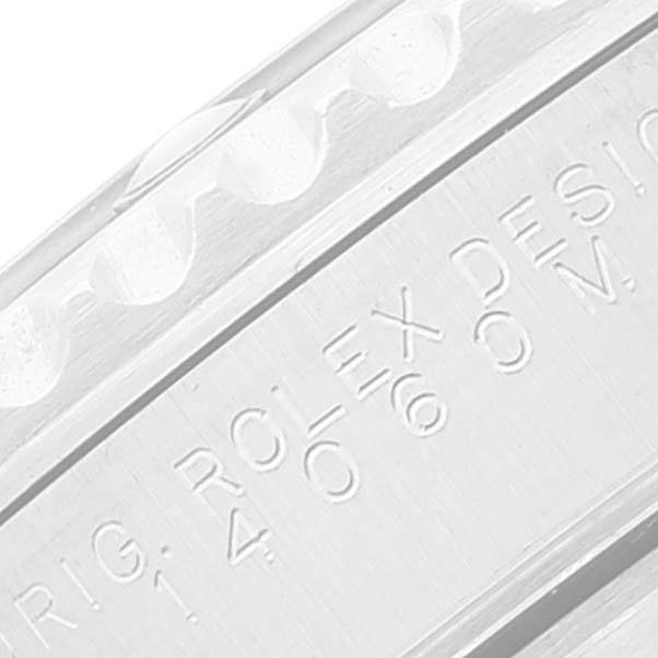 The image shows a close-up angle of the bezel and the engraved side case of a Rolex Submariner 14060M Men
s Stainless Steel Black Dial 14060M Men
s Stainless Steel Black Dial watch.