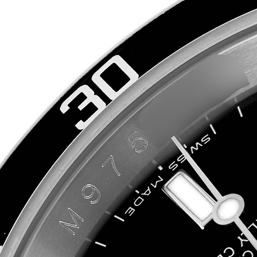 The image shows a close-up of the bezel and partial dial of a Rolex Submariner 16610 Men
s Stainless Steel Black Dial 16610 Men
s Stainless Steel Black Dial, focusing on the 30-minute mark and hands.