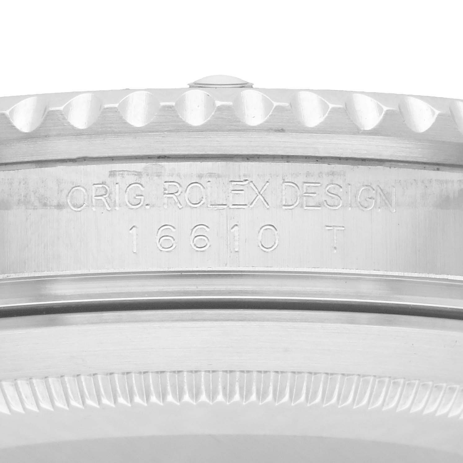The image shows a close-up of the case side engraving on a Rolex Submariner 16610 Men
s Stainless Steel Black Dial, highlighting the model number "16610T".