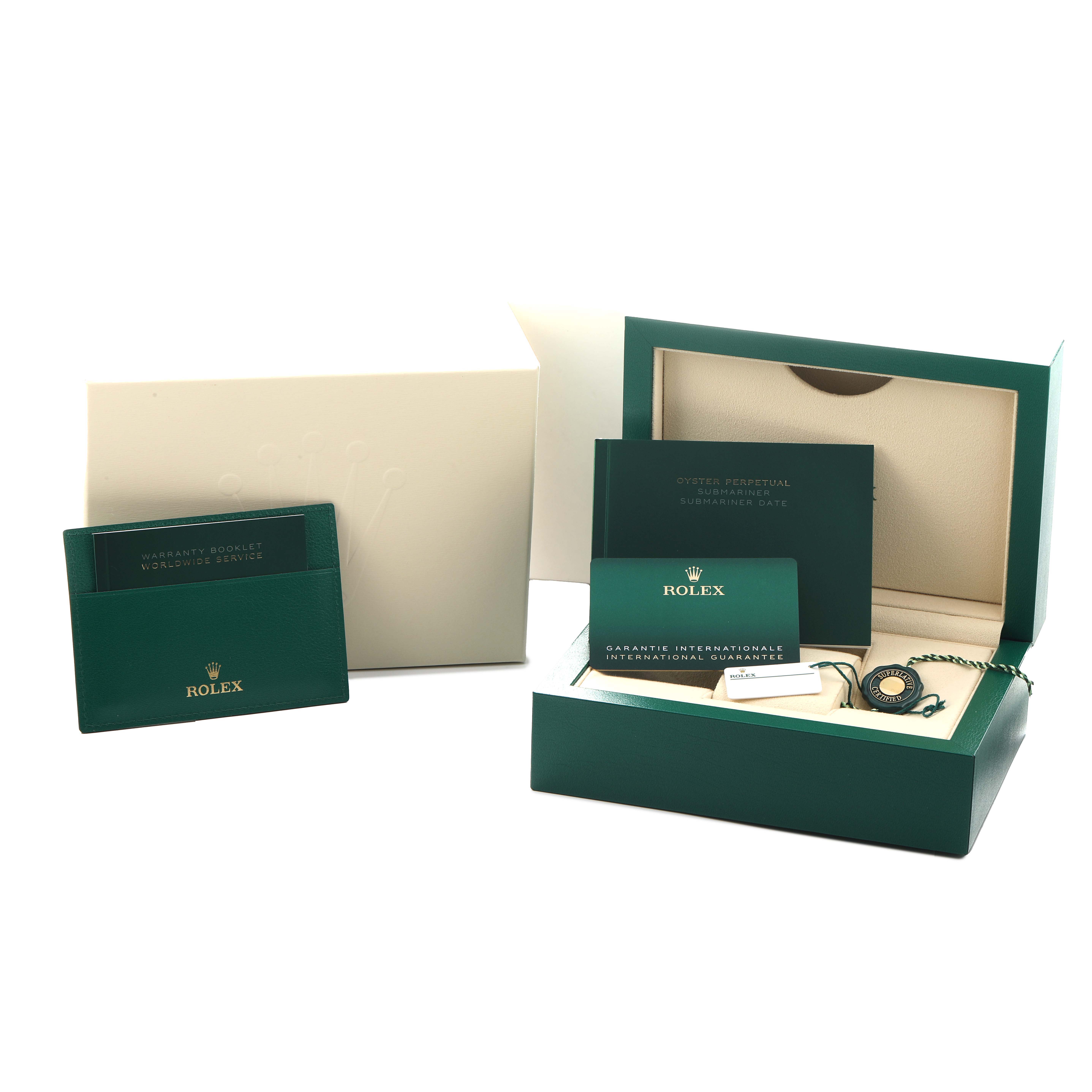 The image shows the Rolex Submariner 126610 Men
s Stainless Steel Black Dial packaging, including the box, manuals, warranty card, and tag from an angled perspective.