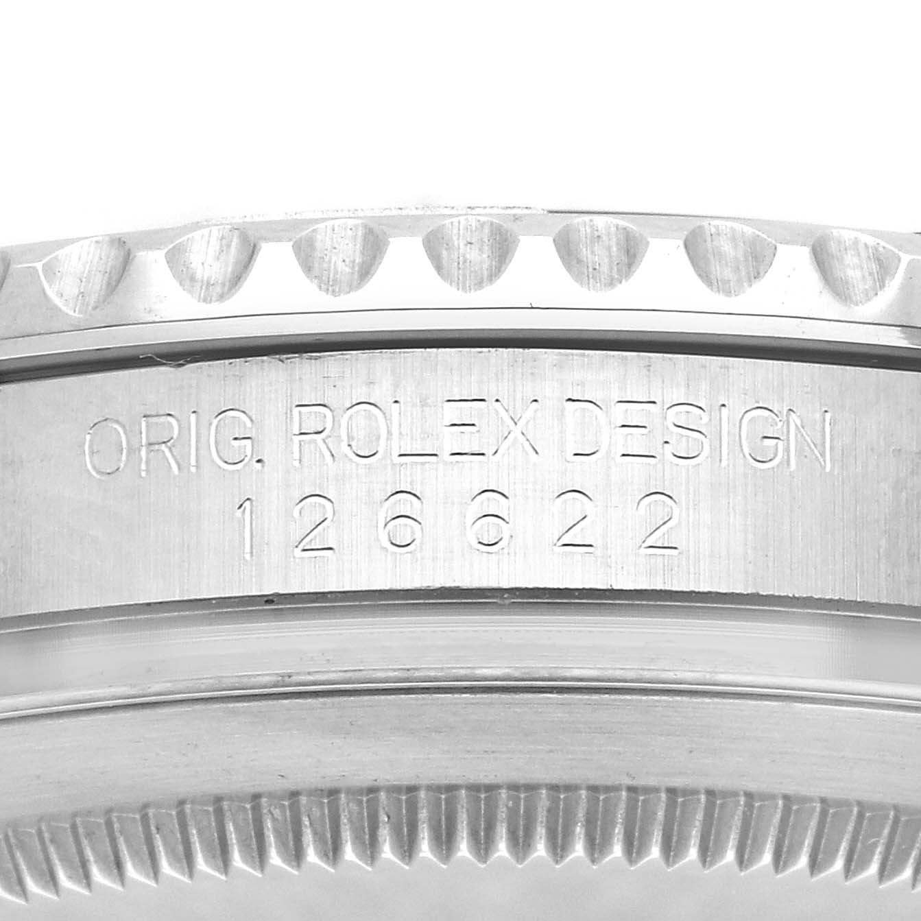 The image shows the side view of the bezel and engraved design details on the Yacht-Master model by Rolex.