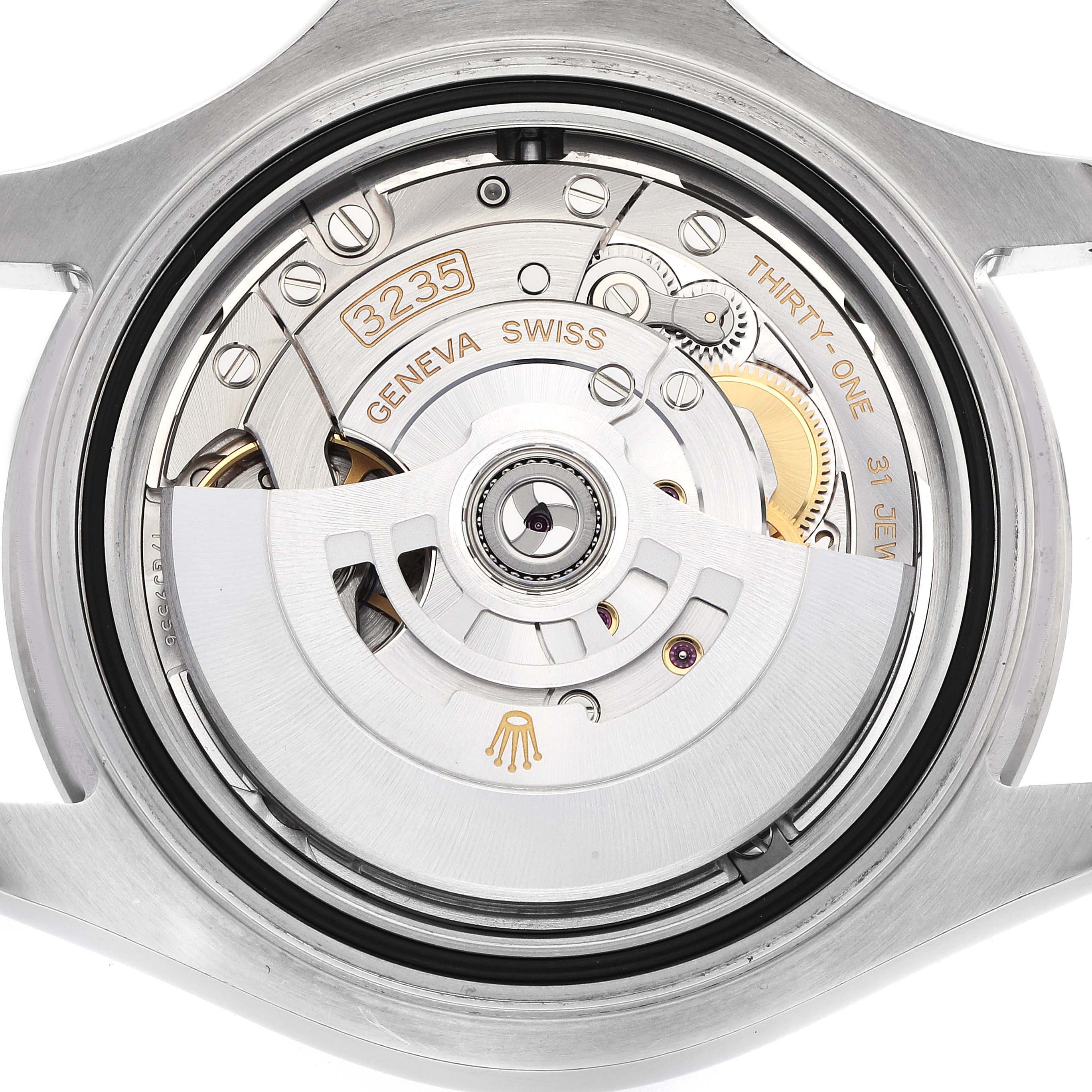 The image shows the movement of a Rolex Yacht-Master 126622 Men
s Stainless Steel Silver Dial watch from the back, highlighting its intricate mechanical parts and engravings.