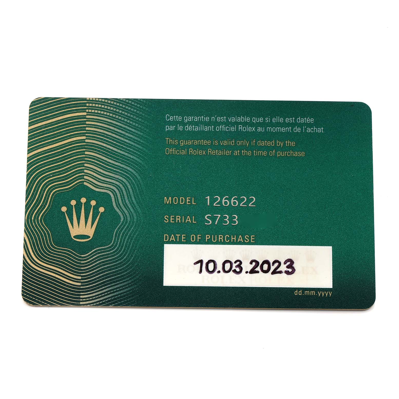 The image shows a warranty card for a Rolex Yacht-Master 126622 Men
s Stainless Steel Silver Dial, displaying model and serial numbers with purchase date.