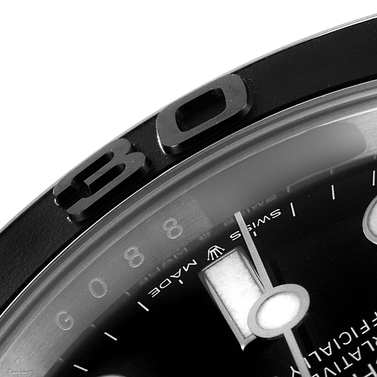 This close-up image of a Rolex Yacht-Master 226659 Men
s White Gold Black Dial 226659 Men
s White Gold Black Dial watch highlights its bezel and partial view of the dial.