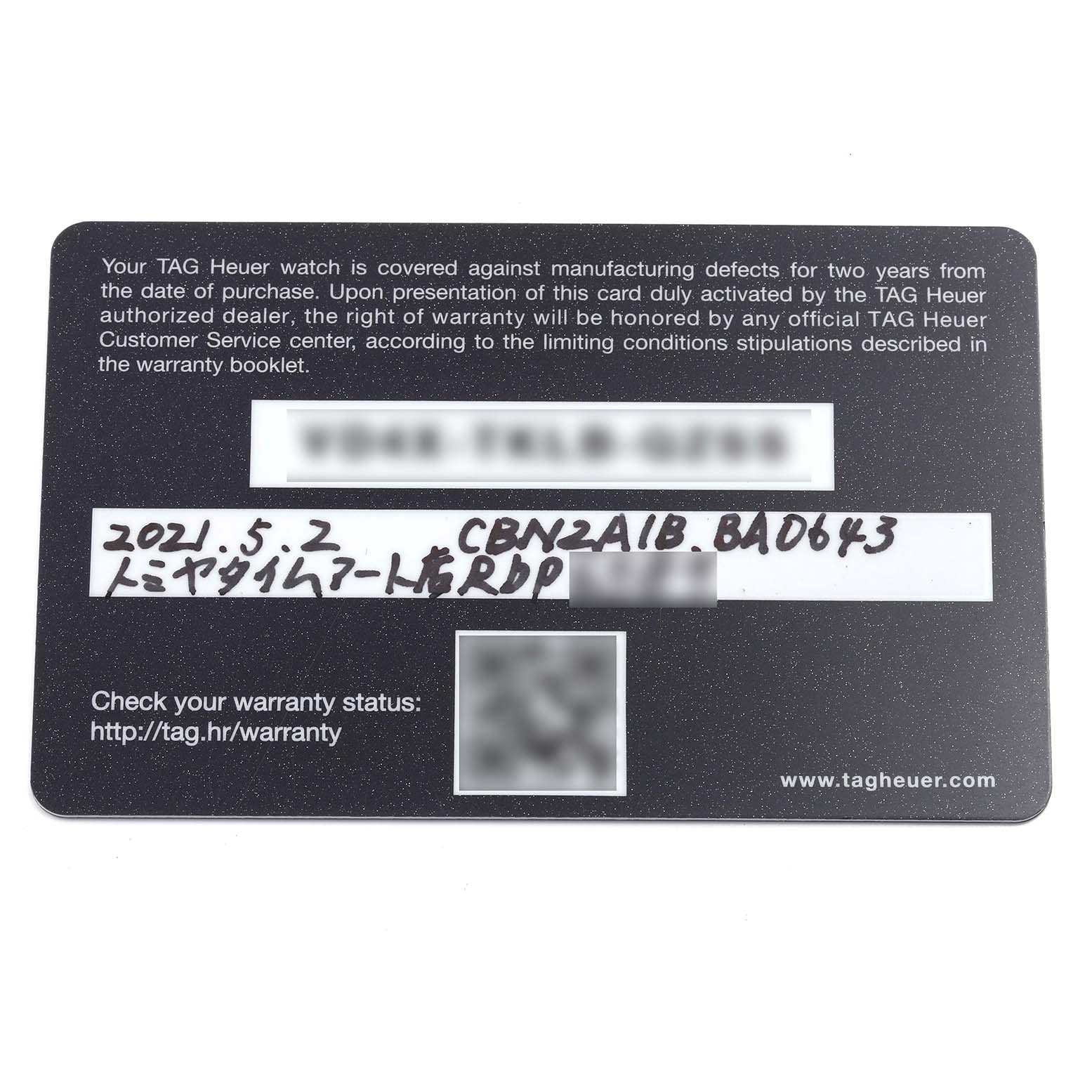 The image shows a Tag Heuer Carrera CBN2A1B.BA0643 Men's Stainless Steel Black Dial CBN2A1B.BA0643 Men's Stainless Steel Black Dial warranty card with written details.