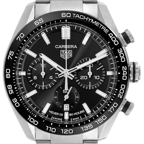 The Tag Heuer Carrera watch is shown from a front angle, highlighting the dial, subdials, and tachymeter bezel.