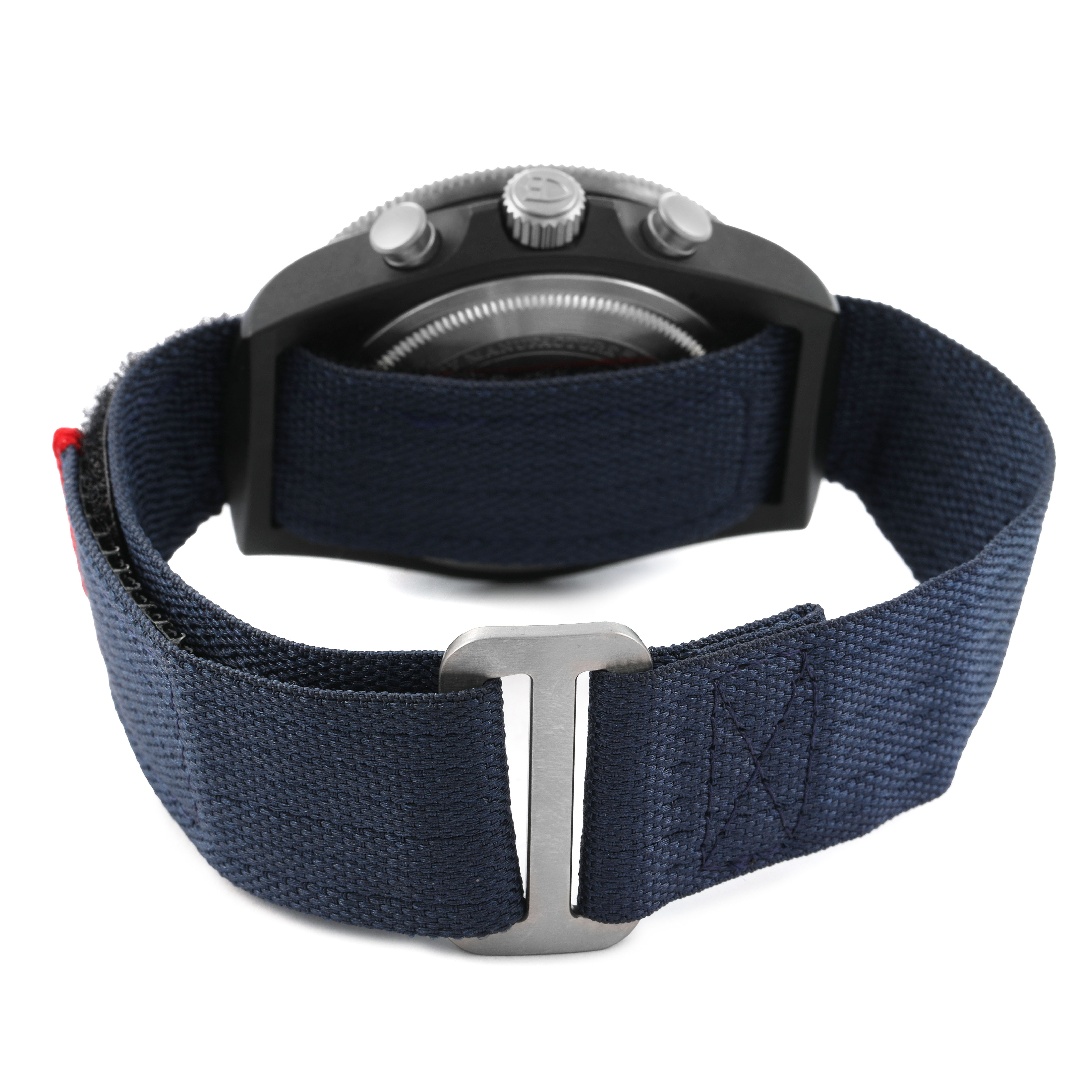 The image shows the back view of a Tudor Pelagos 25807 Men's Ceramic Blue Dial watch, highlighting the case back, crown, and fabric strap.