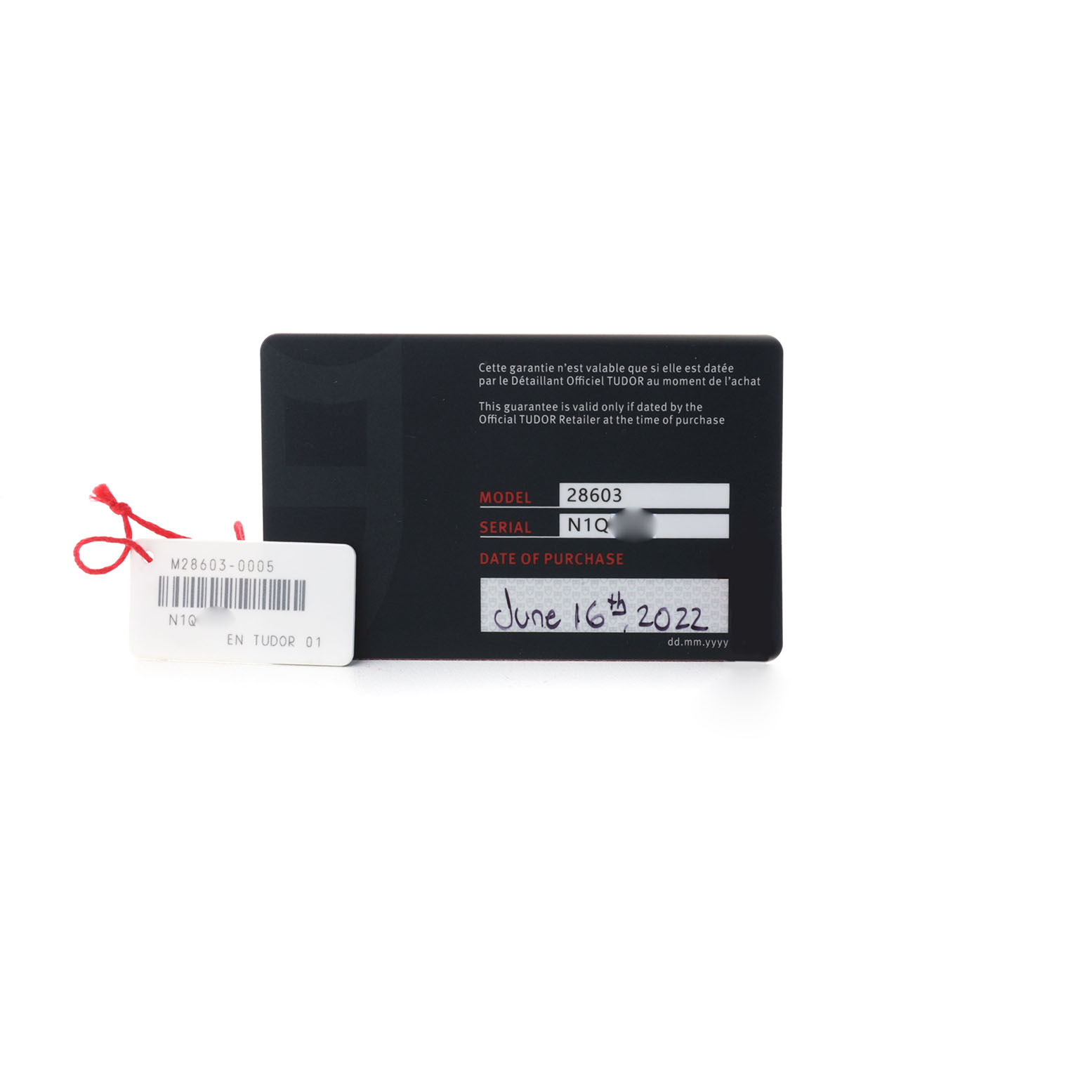 The image shows the warranty card and tag for the Tudor Royal 28603 Men's Stainless Steel Black Dial model, displaying the model number, serial number, and purchase date.