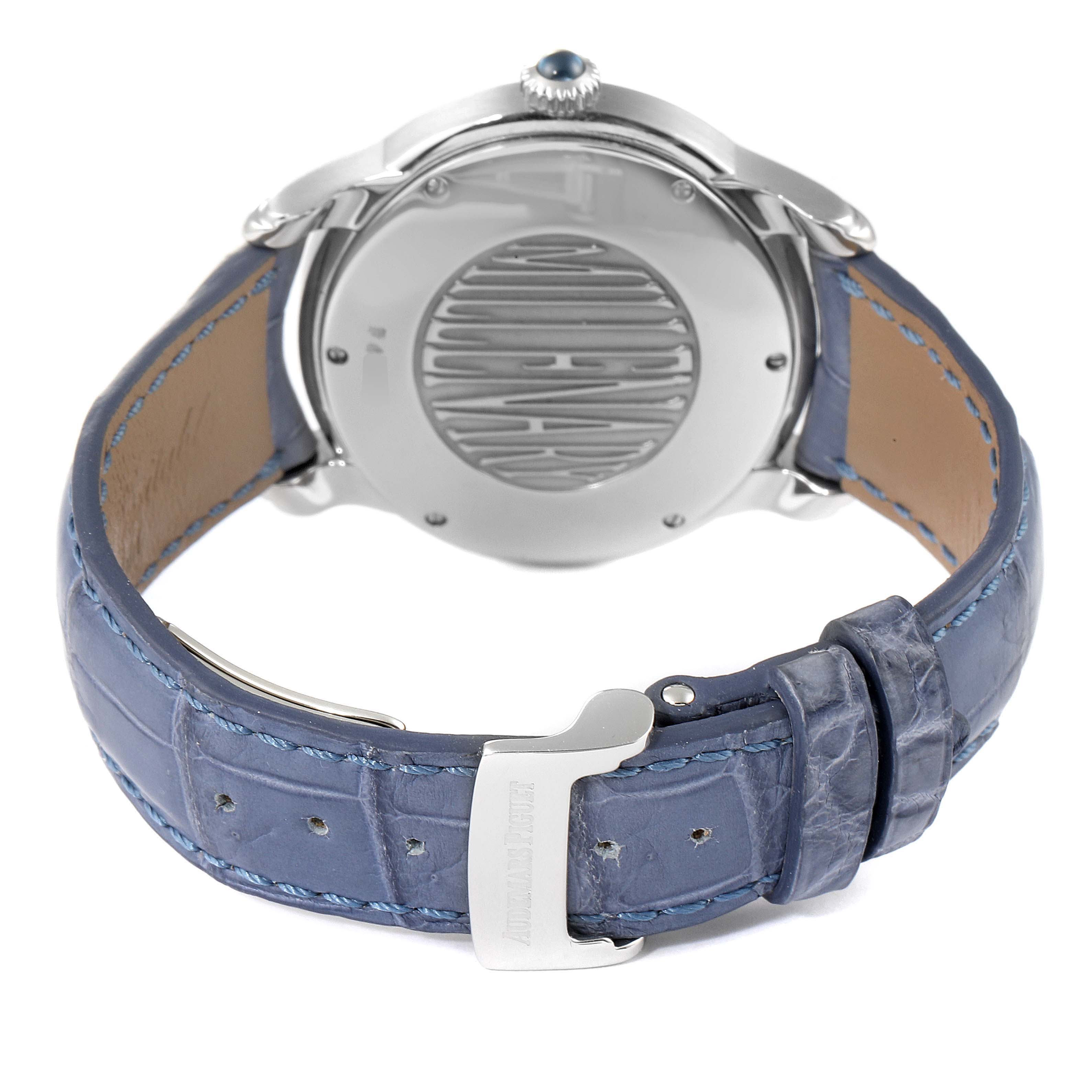 The image shows the back view of a Millenary model watch by Audemars Piguet, highlighting the case back and blue leather strap.