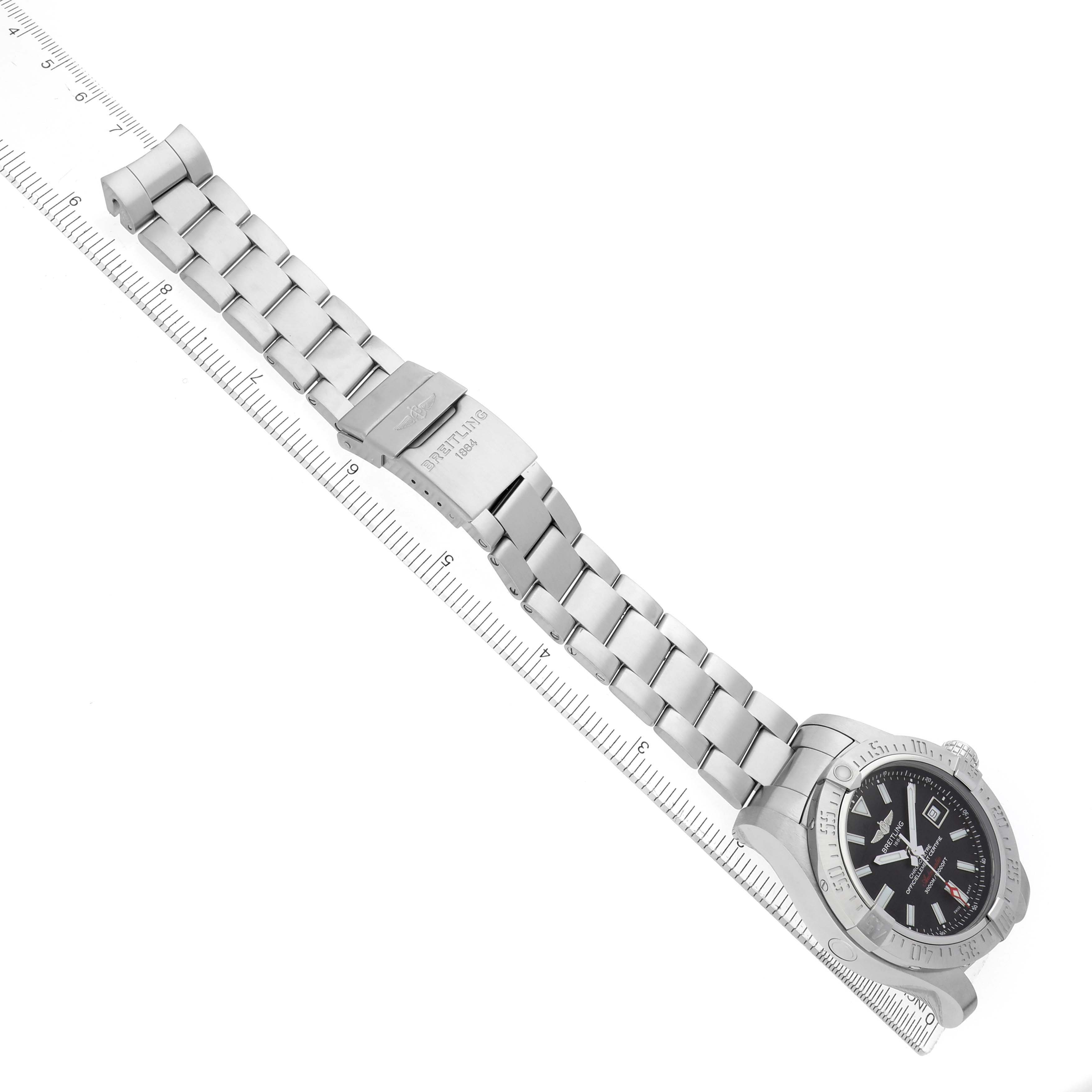 The Breitling Avenger A17331 Men
s Stainless Steel Black Dial watch is shown diagonally from a top-down angle, displaying the bracelet, clasp, and face.