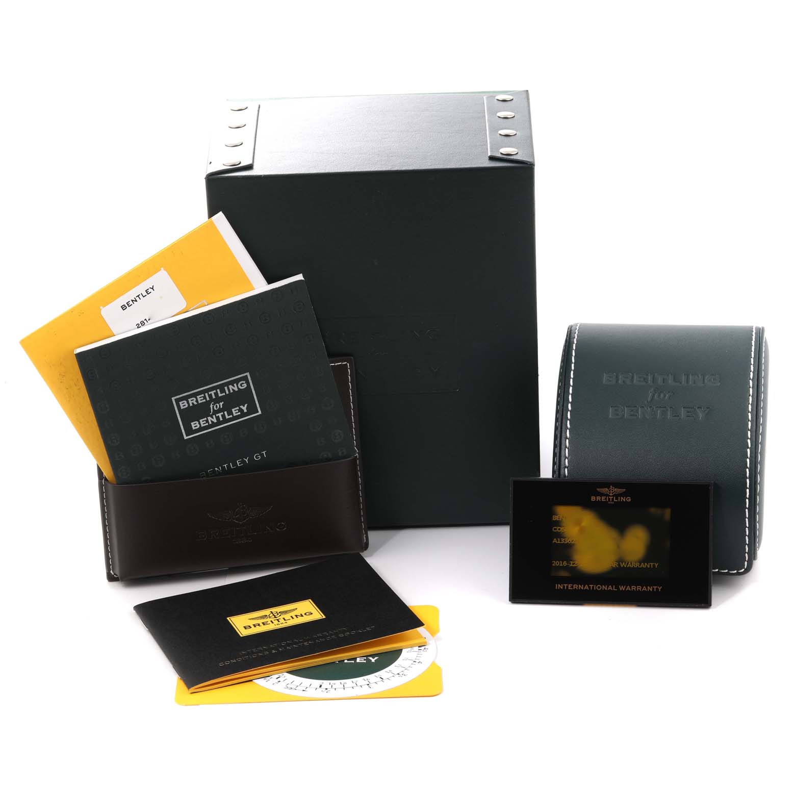 The image shows the accessories for the Breitling Bentley A13362 Men's Stainless Steel Mother of Pearl Dial A13362 Men's Stainless Steel Mother of Pearl Dial watch, including a box, manuals, a card holder, and an international warranty card.