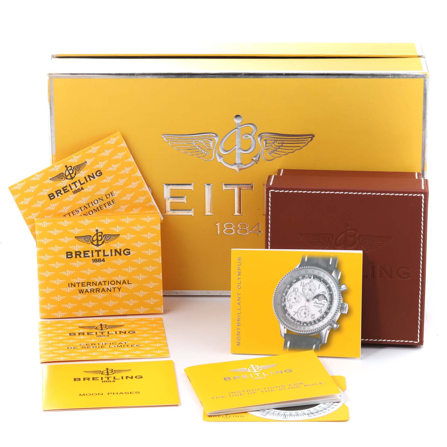 The image shows a Breitling Navitimer H19350 Men's Rose Gold Silver Dial H19350 Men's Rose Gold Silver Dial watch box, manuals, warranty cards, and a brown leather case from a frontal angle.