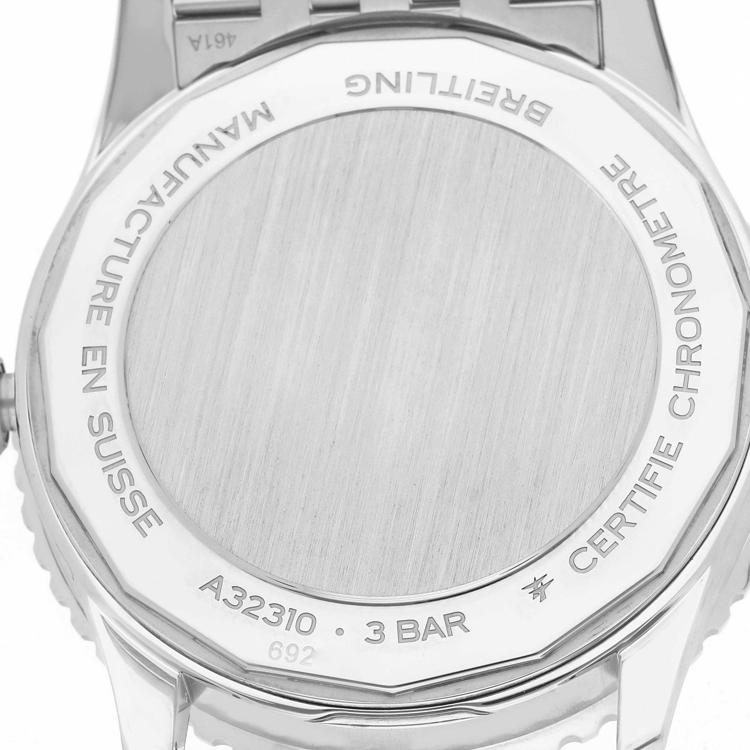 The image shows the case back of a Breitling Navitimer A32310 Men
s Stainless Steel Blue Dial watch, featuring engravings and model details.