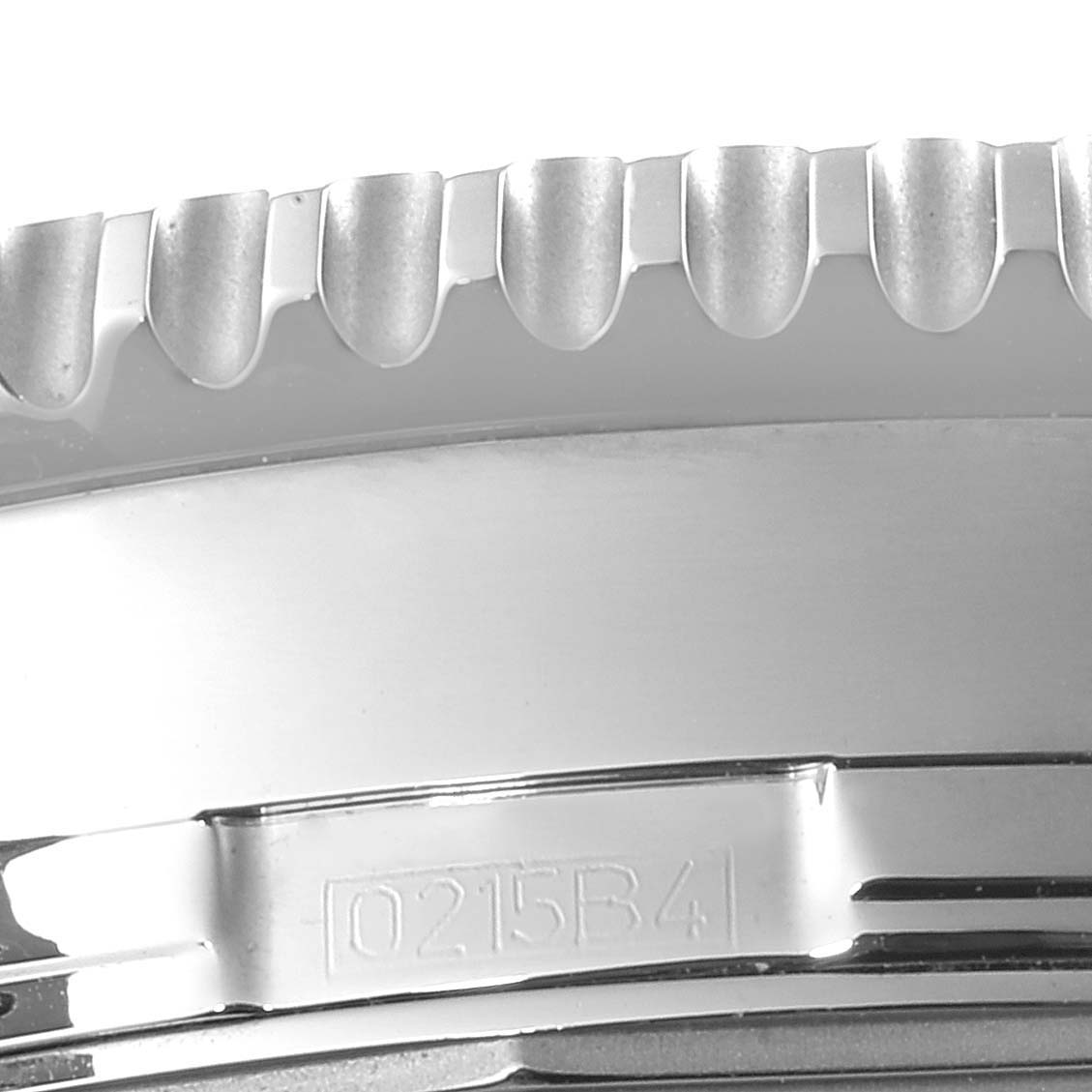 This close-up image shows the detailed, serrated edge of a Breitling Navitimer A24322 Men's Stainless Steel Black Dial A24322 Men's Stainless Steel Black Dial watch bezel.