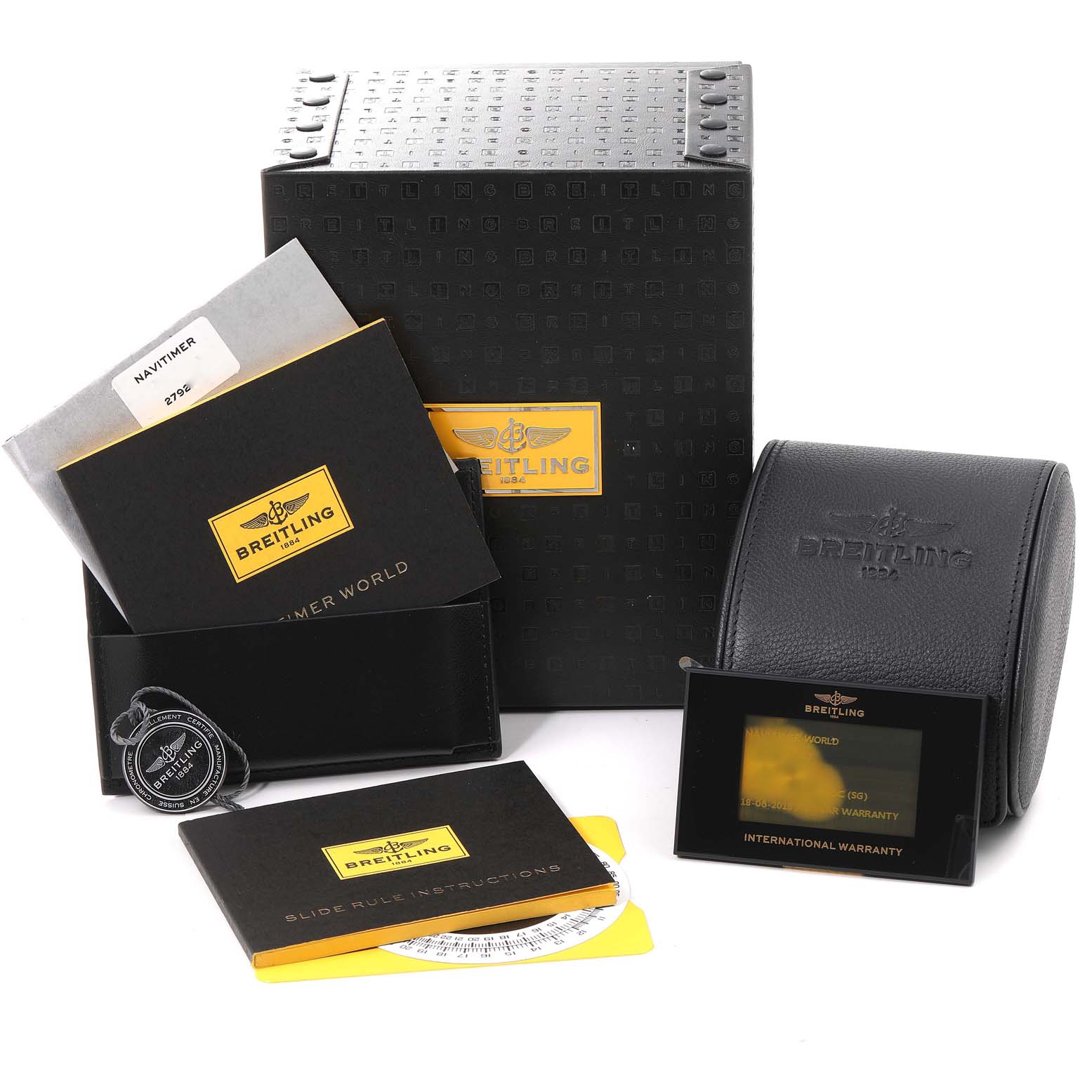 The image shows the packaging, manuals, warranty card, and booklet of the Breitling Navitimer A24322 Men's Stainless Steel Black Dial A24322 Men's Stainless Steel Black Dial watch, all displayed from a front angle.