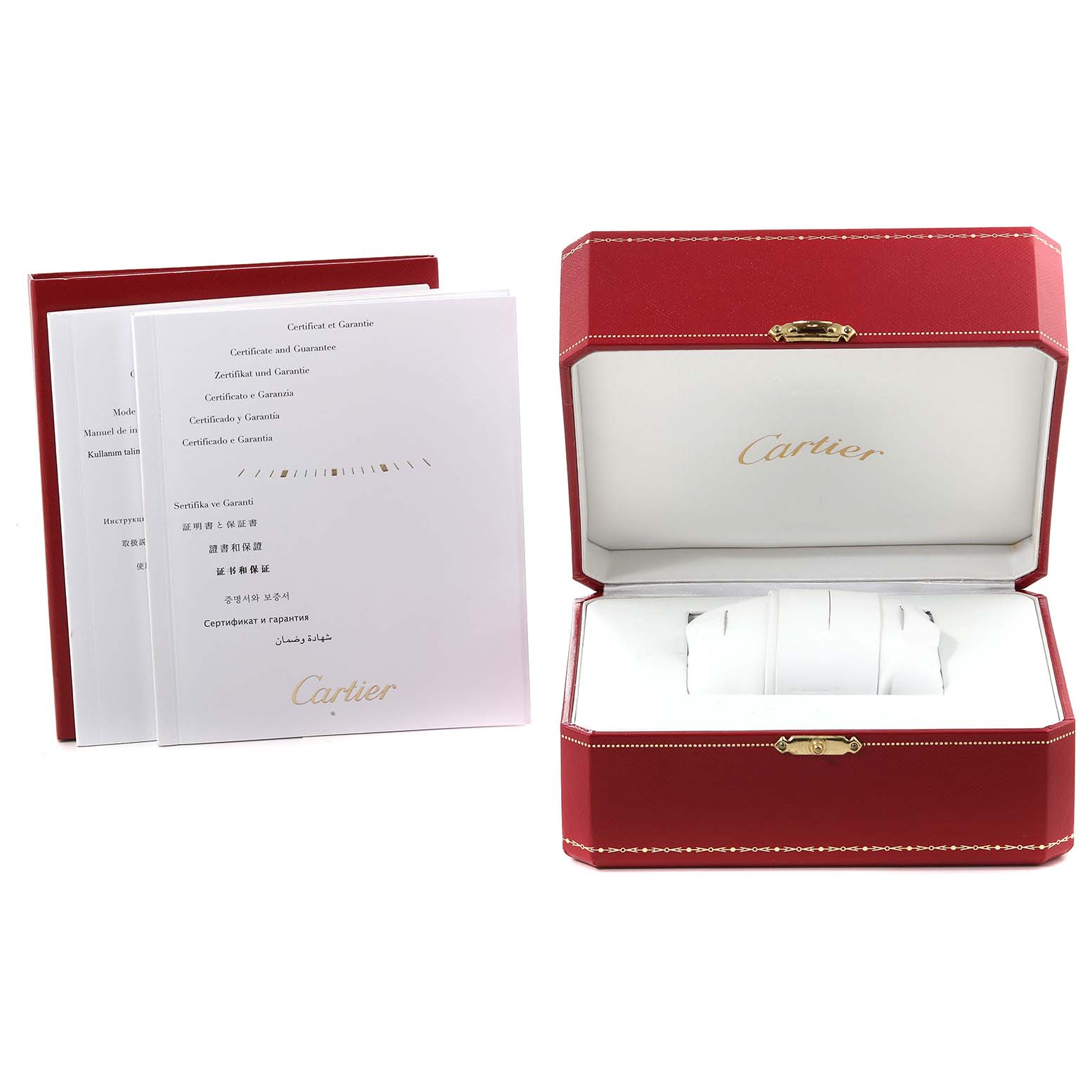 The image shows an open red Cartier watch box and accompanying manuals for the Ballon Bleu model.