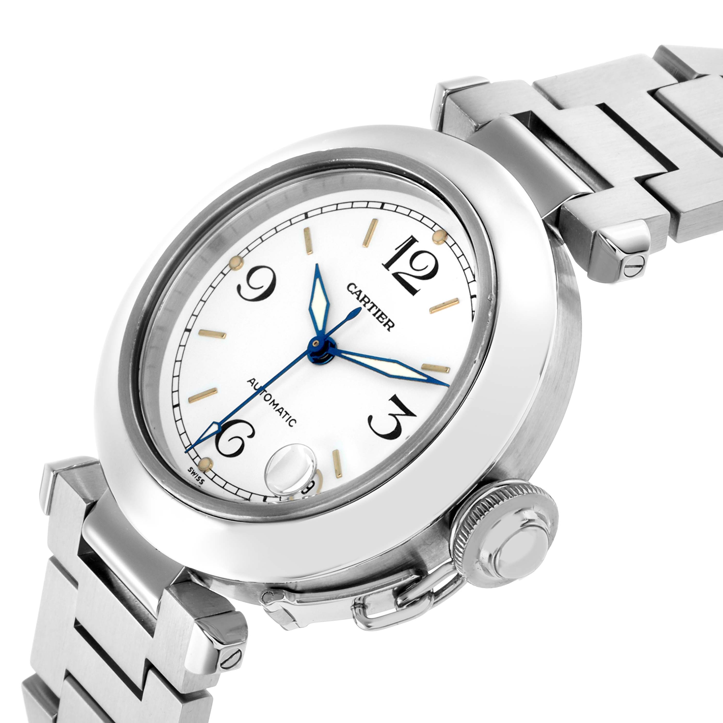 The Cartier Pasha W31015M7 Men
s Stainless Steel White Dial watch is shown at an angle highlighting the face, bezel, crown, and part of the bracelet.