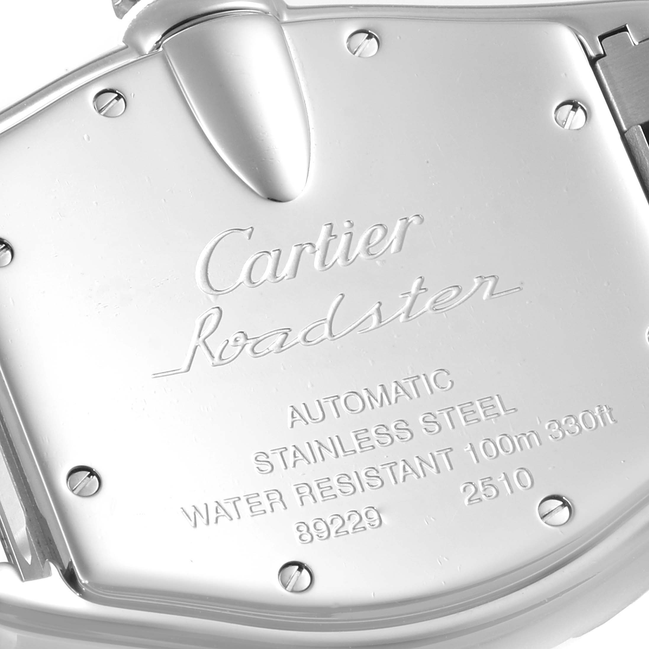 This image shows the back case of a Cartier Roadster W62000V3 Men
s Stainless Steel Silver Dial W62000V3 Men
s Stainless Steel Silver Dial watch, highlighting the engravings and screws.
