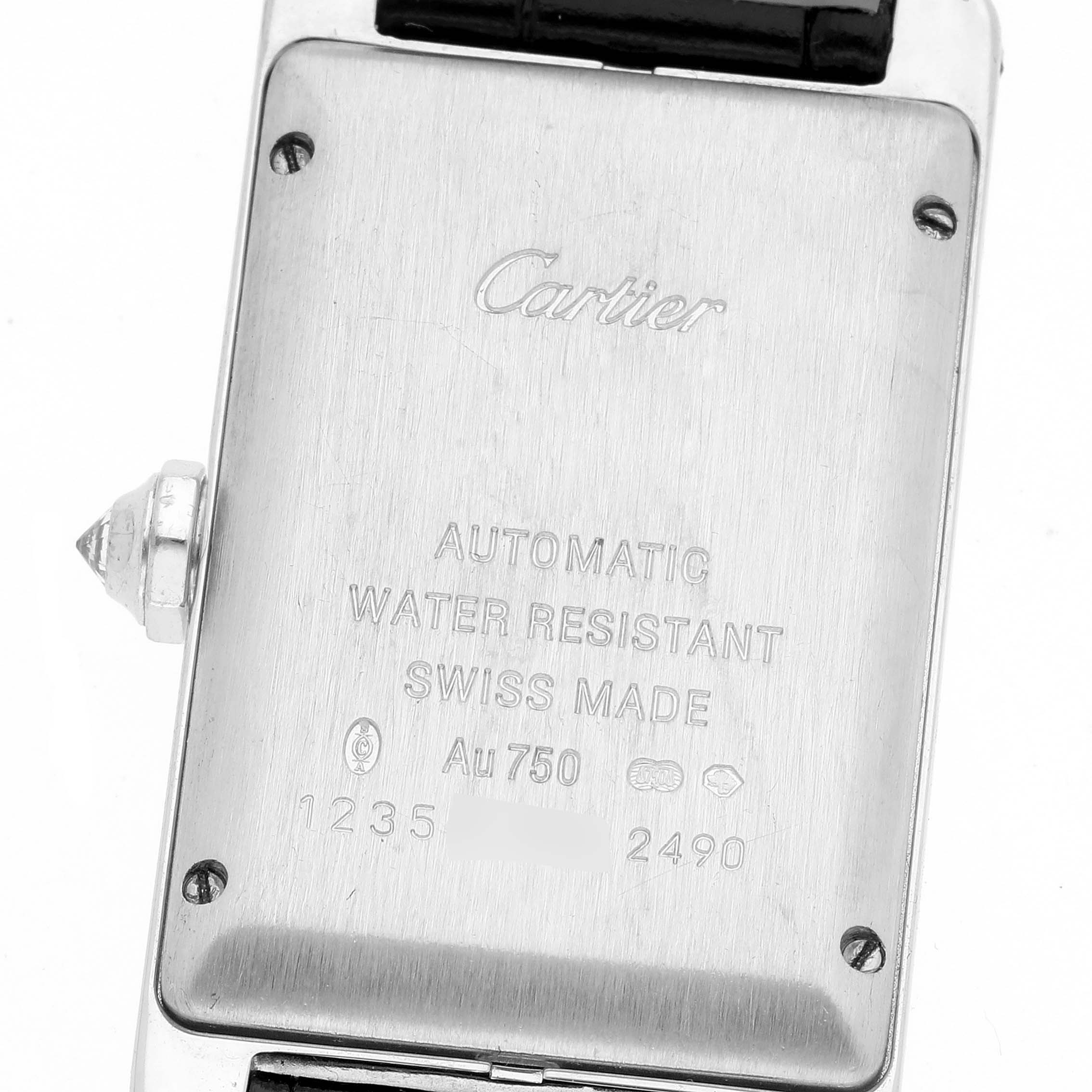 The image shows the back case and crown of a Cartier Tank Americaine 2490 Women's White Gold Silver Dial 2490 Women's White Gold Silver Dial watch.